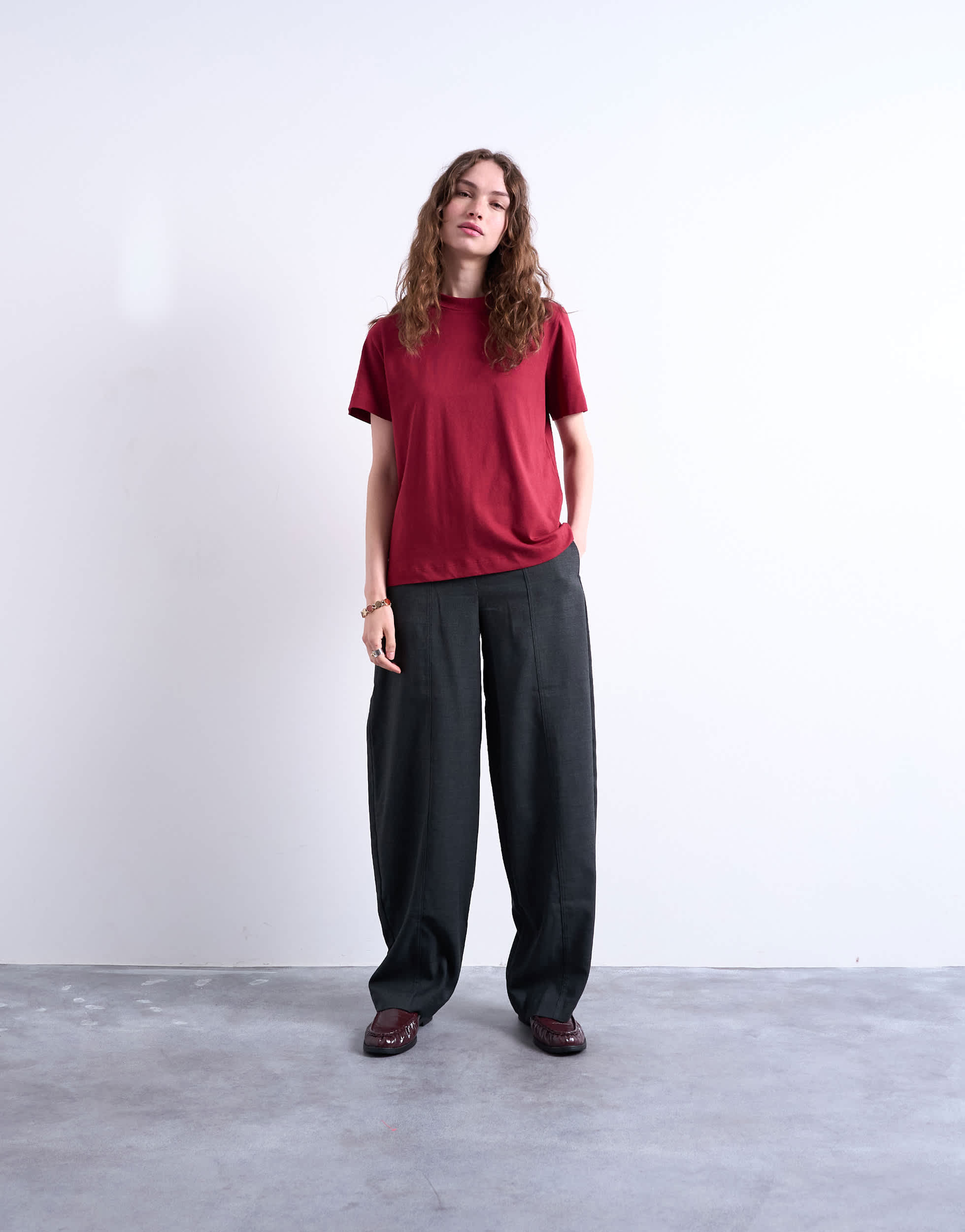 Topshop mid rise balloon leg clean waistband tapered trouser in charcoal