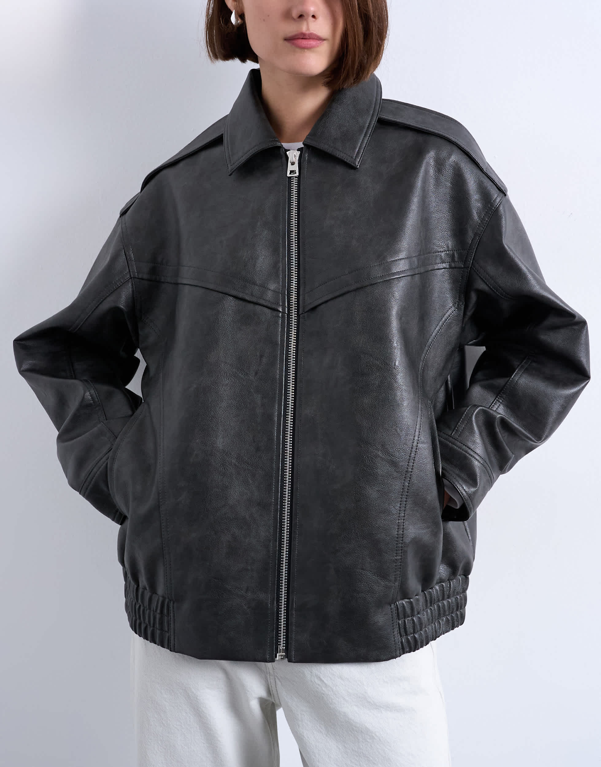 Topshop oversized faux leather bubble vintage wash seam detail zip thru bomber jacket in washed black
