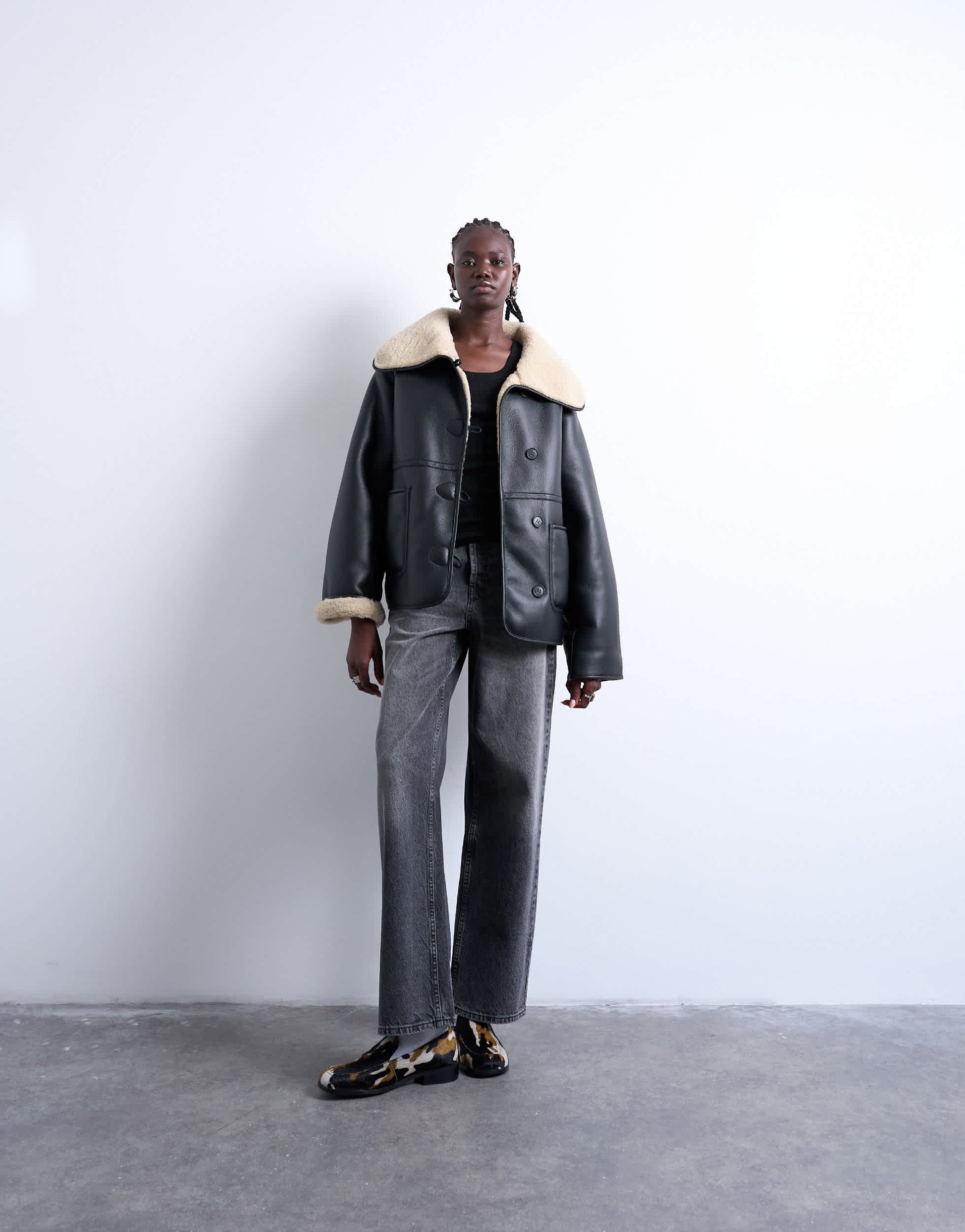 Topshop shearling oversized reversible coat with button loop in black and cream