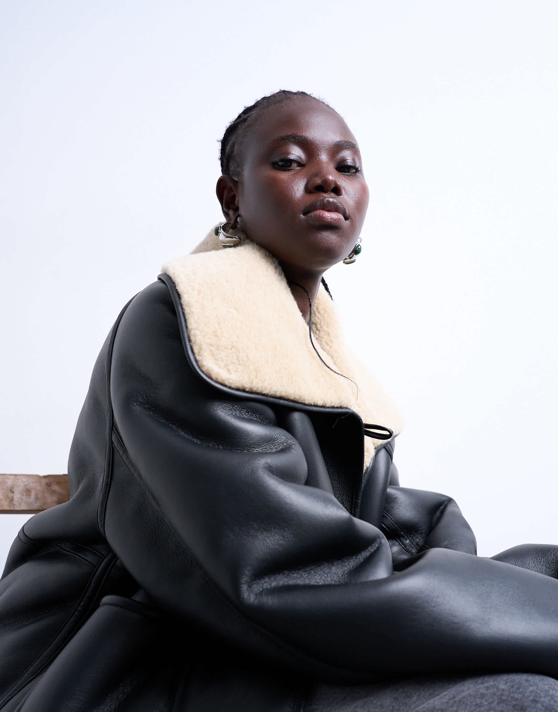 Topshop shearling oversized reversible coat with button loop in black and cream