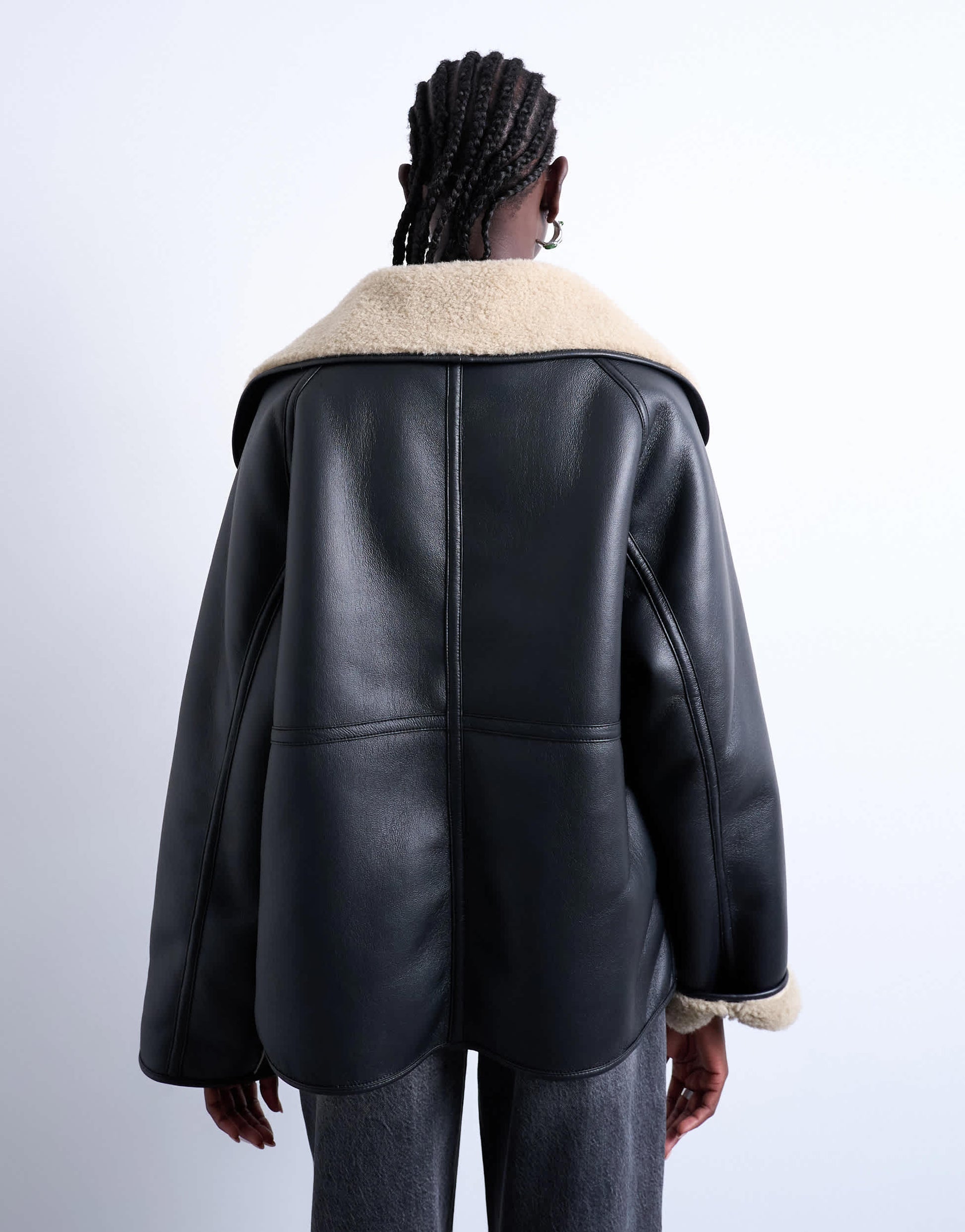 Topshop shearling oversized reversible coat with button loop in black and cream
