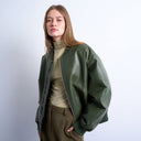 Topshop faux leather vintage wash oversized collarless bomber jacket in green