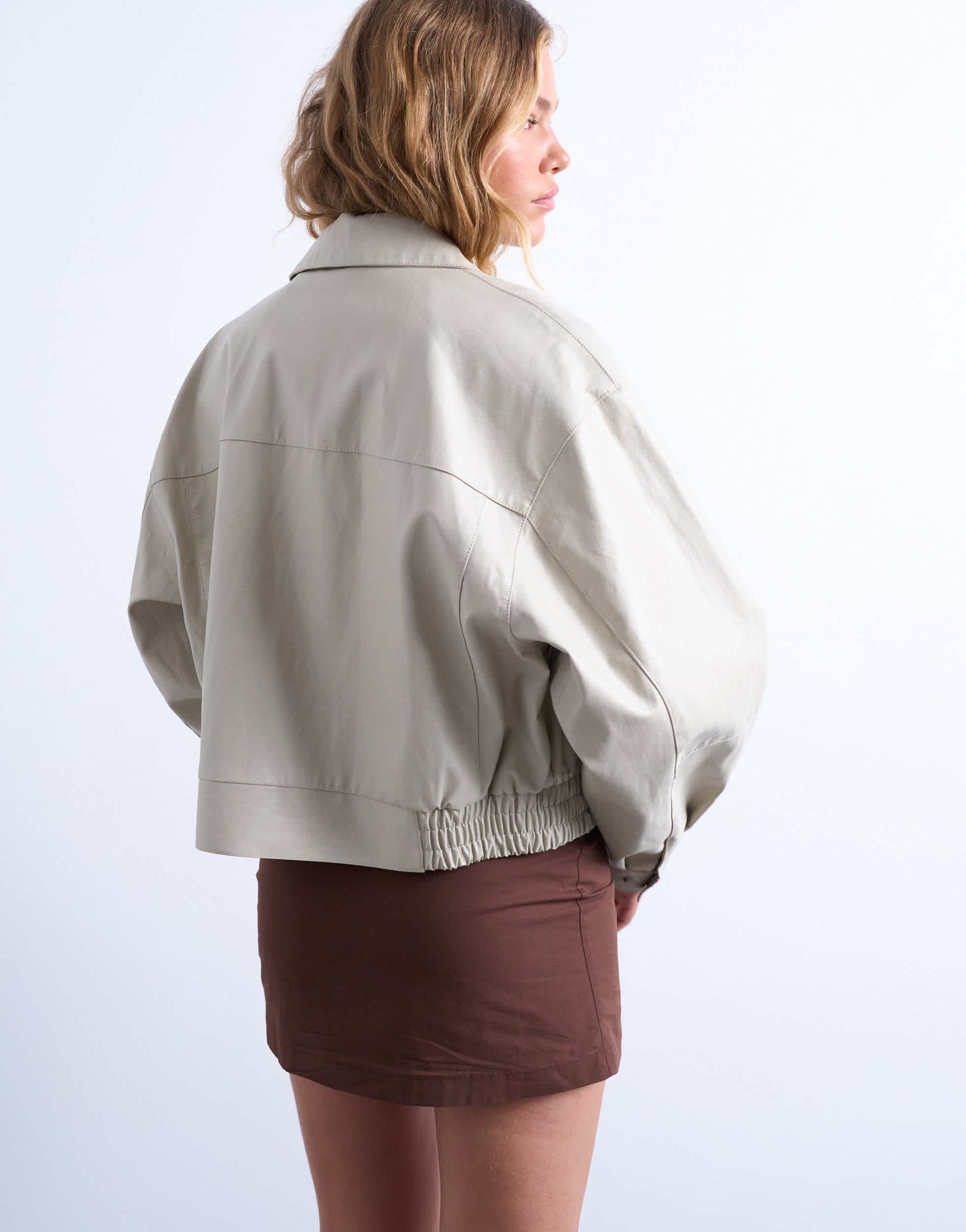 Topshop faux leather drop shoulder cropped zip thru jacket in ecru