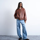 Topshop faux leather vintage wash oversized collarless bomber jacket in tan