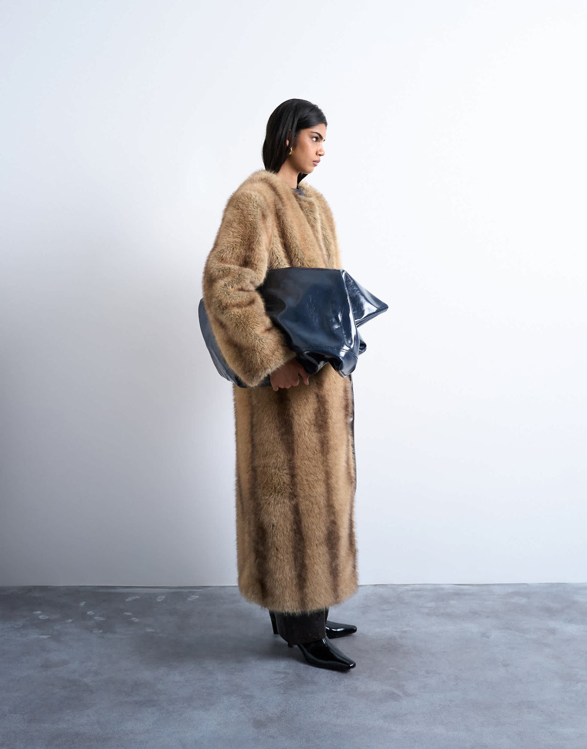 Topshop oversized faux fur collarless long coat in natural stripe in beige