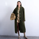 Manteau Topshop en laine kaki, sans doublure, à épaules tombantes et manches bouffantes.