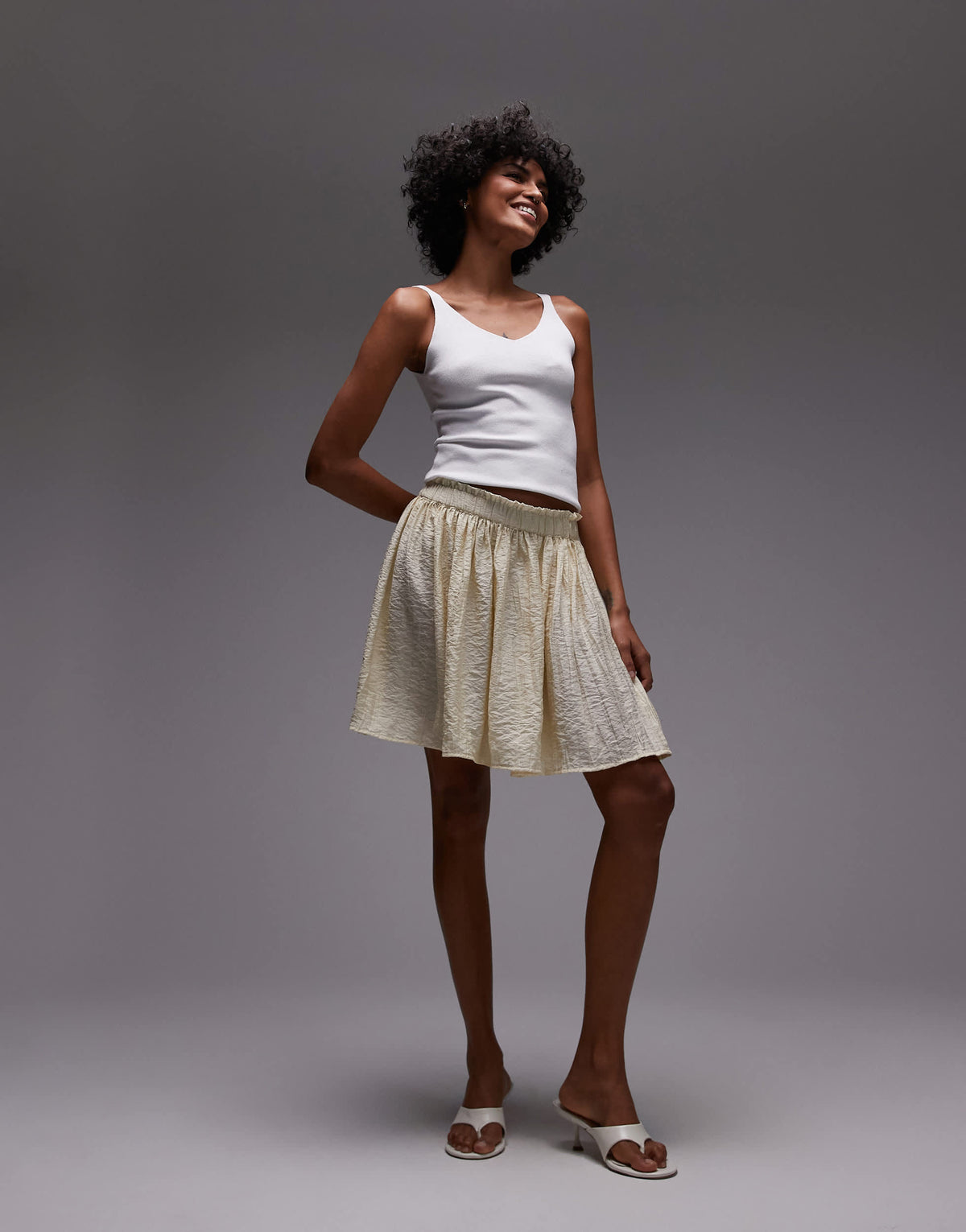 Topshop flippy crinkle mini skirt in sand