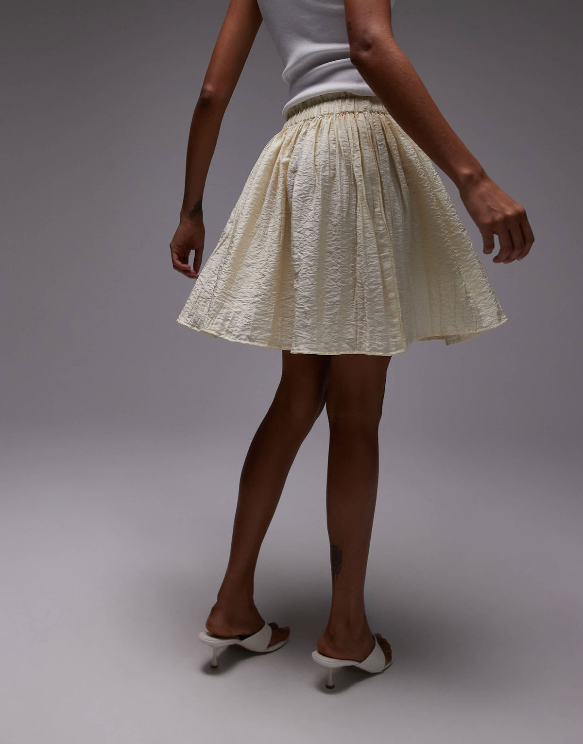 Topshop flippy crinkle mini skirt in sand