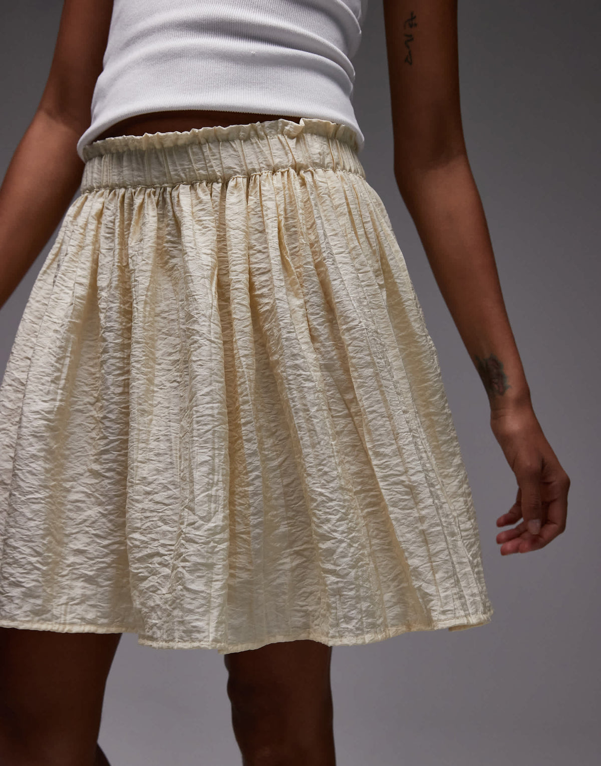 Topshop flippy crinkle mini skirt in sand