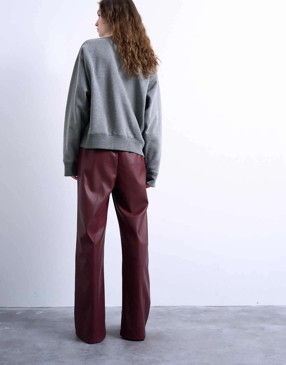 Topshop faux leather wide leg jogger with pinseam detail in burgundy