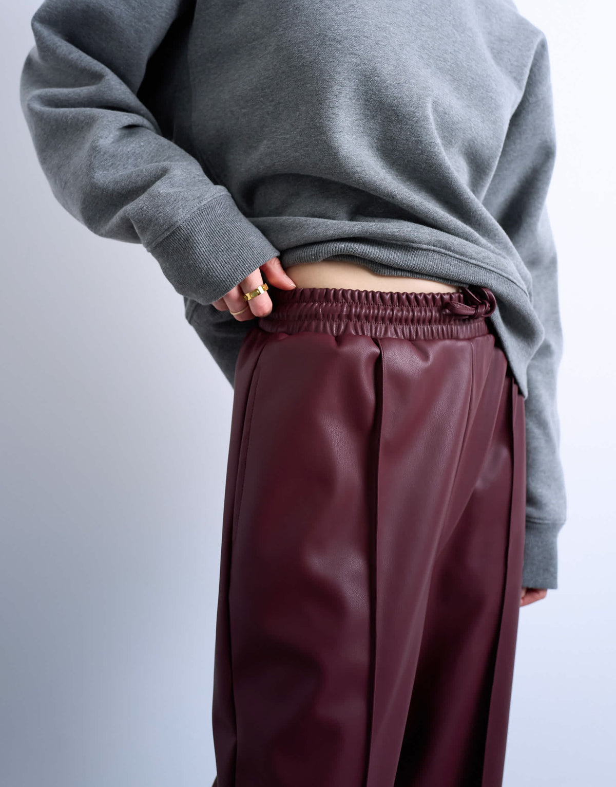 Topshop faux leather wide leg jogger with pinseam detail in burgundy