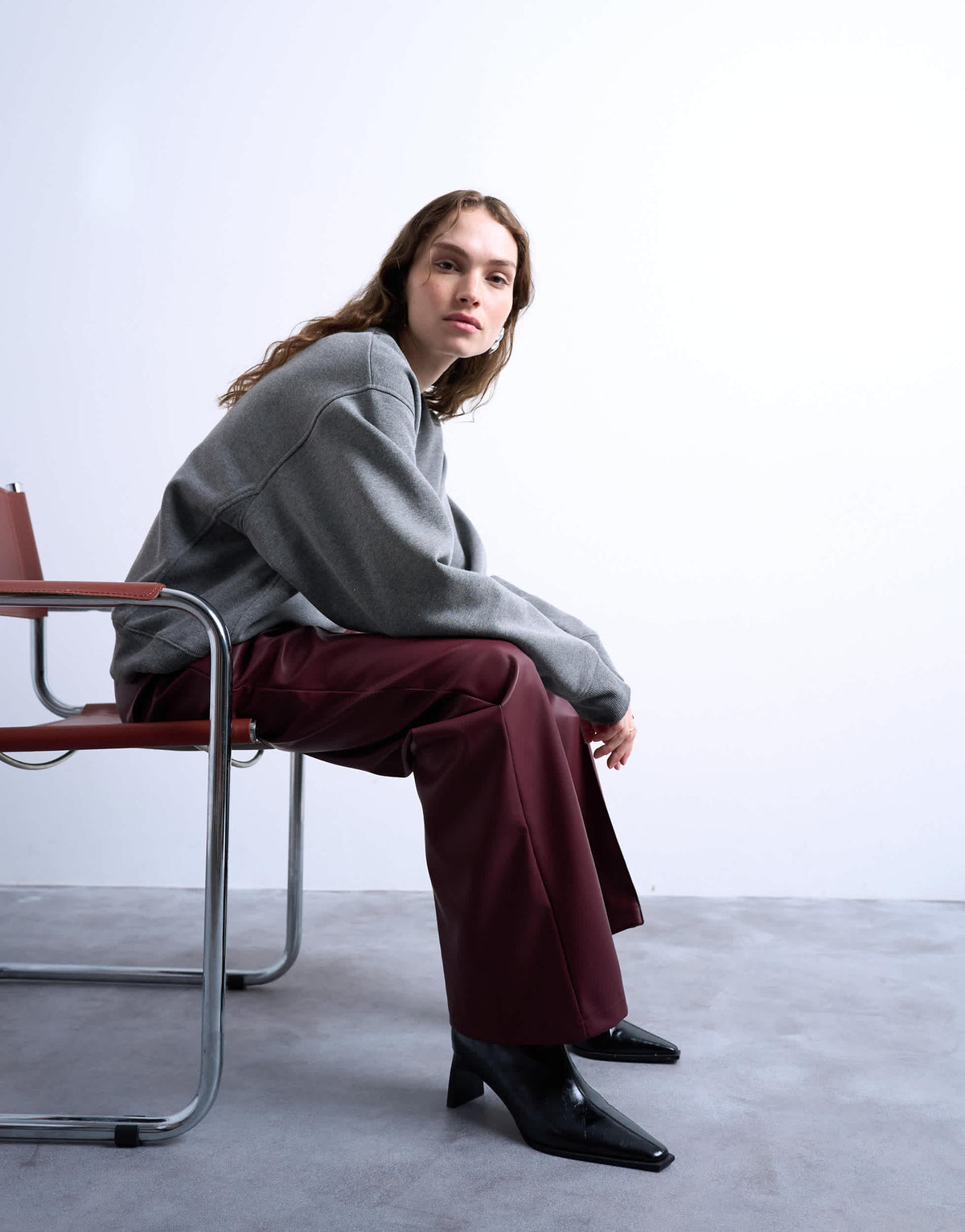 Topshop faux leather wide leg jogger with pinseam detail in burgundy