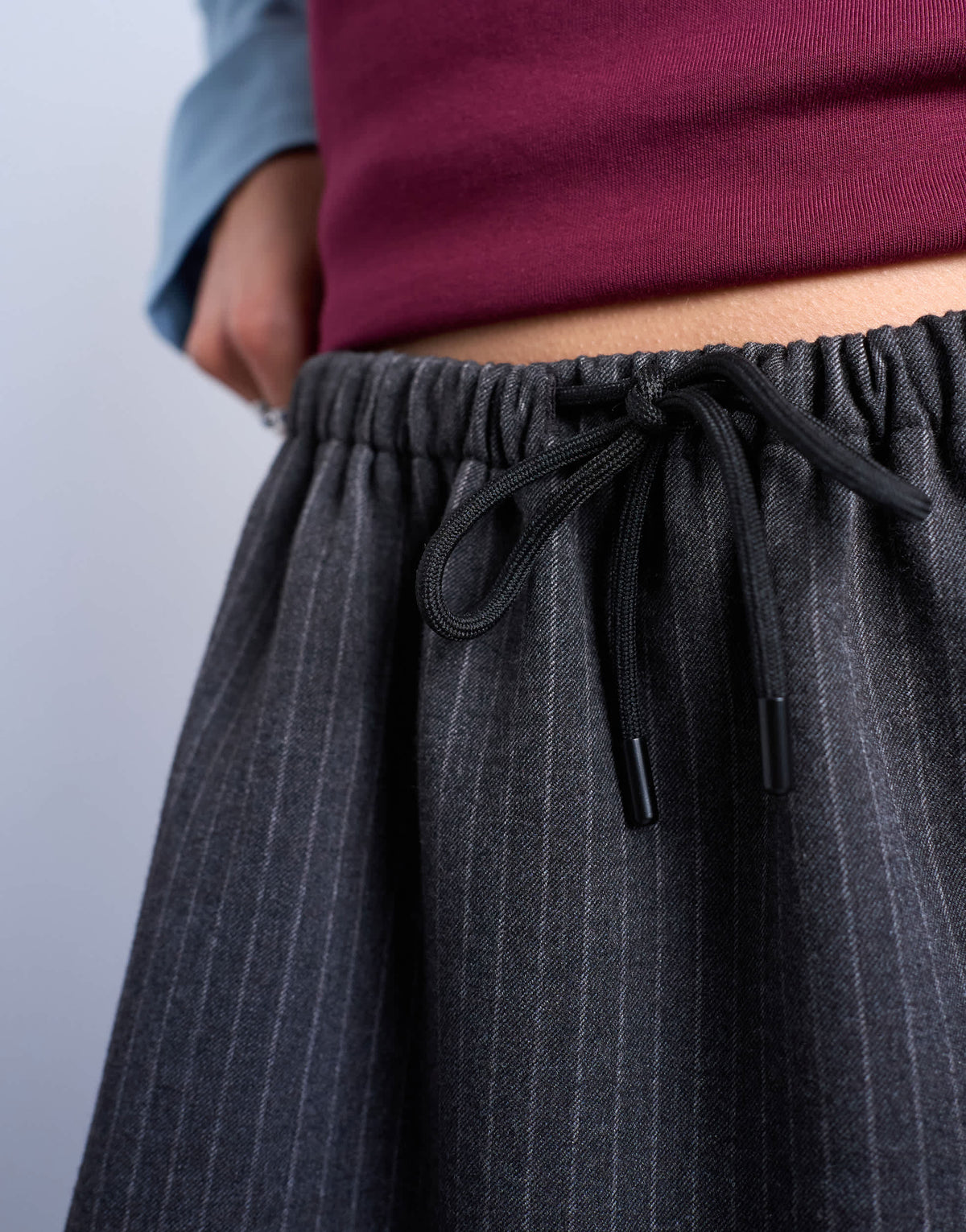 Topshop brushed low rise flippy mini micro skirt in charcoal pinstripe