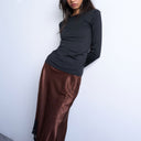 Top Topshop noir à manches longues et dos échancré.