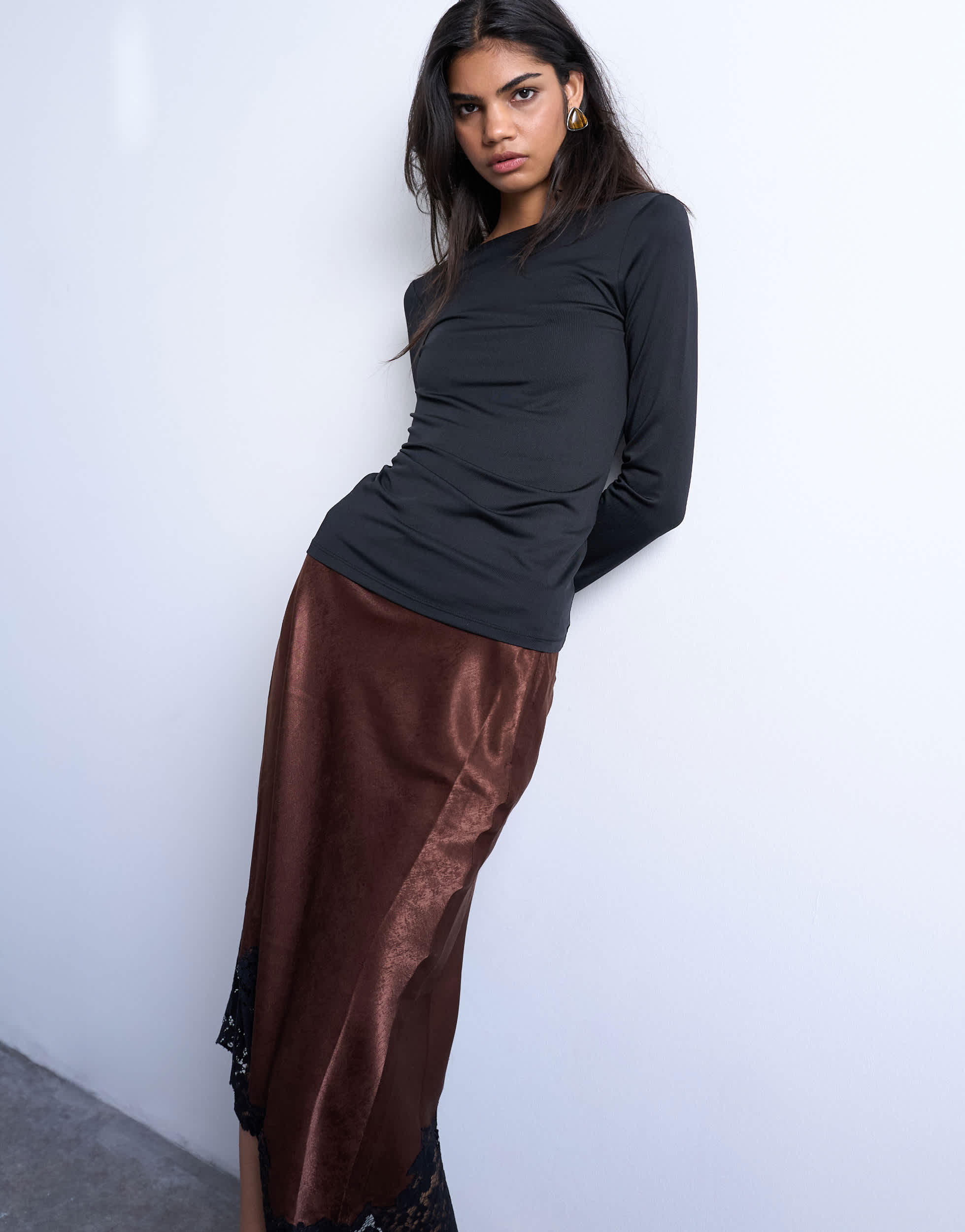 Top Topshop noir à manches longues et dos échancré.