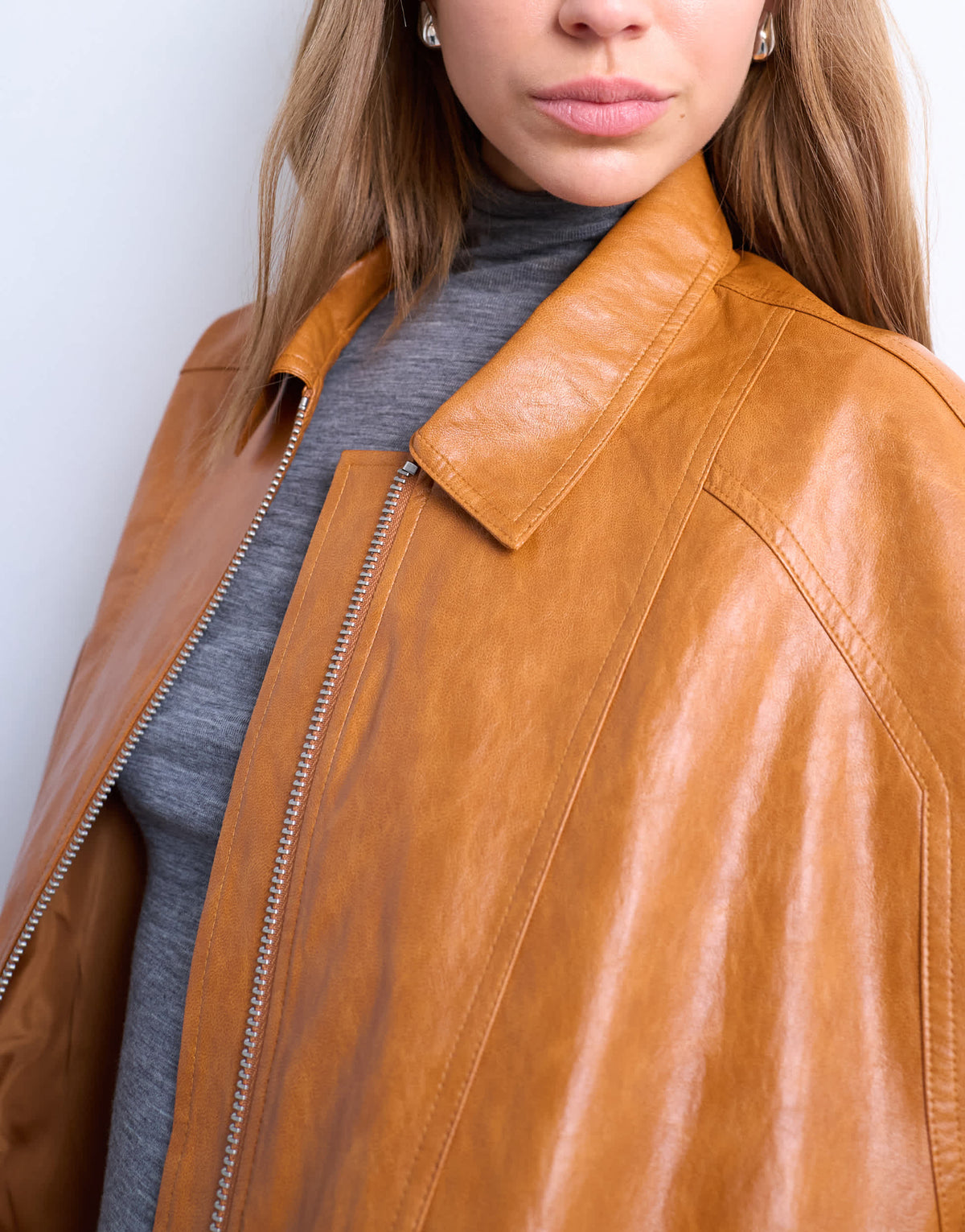 Topshop faux leather zip through seam detail jacket in tan