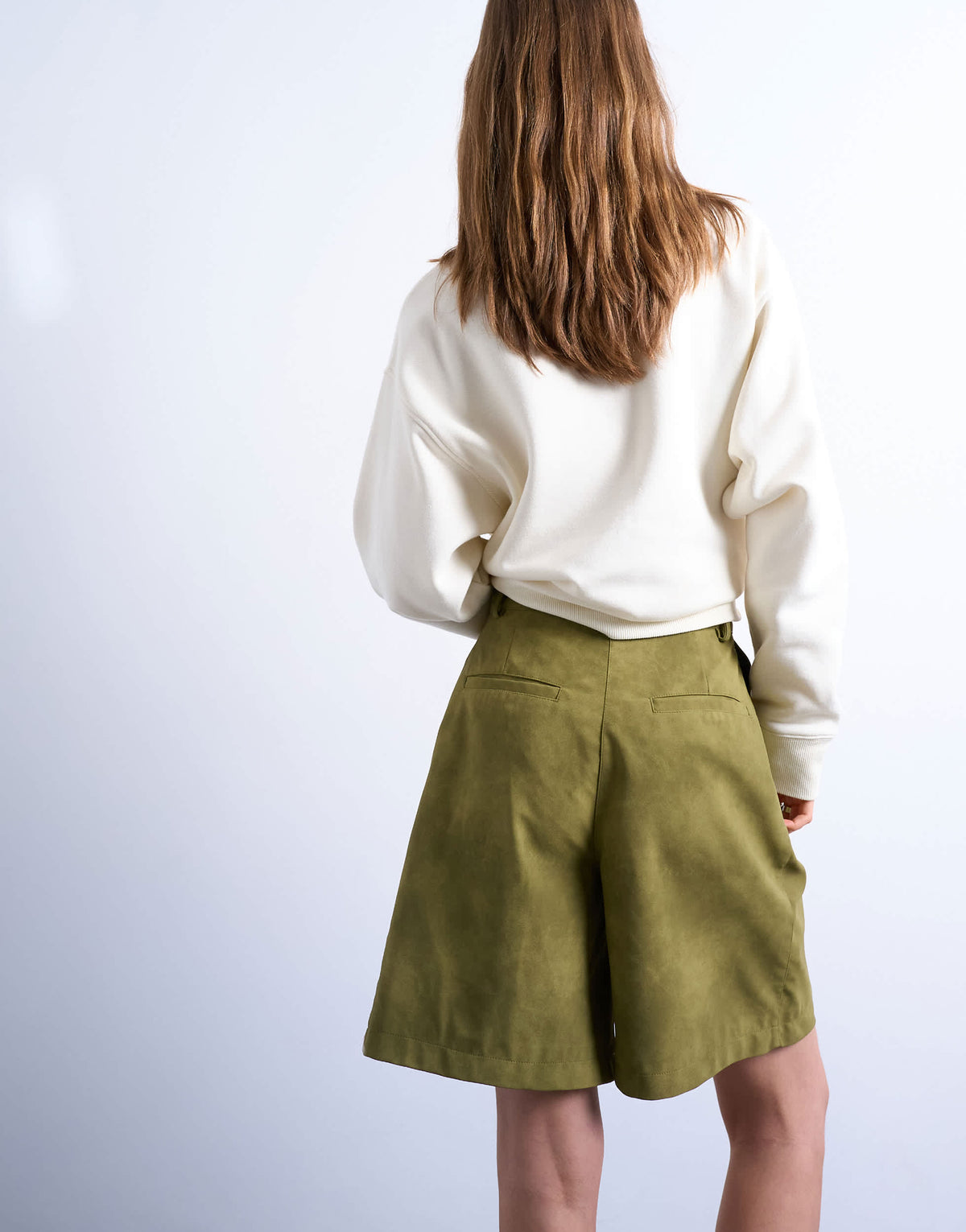 Topshop faux suede longline short in green
