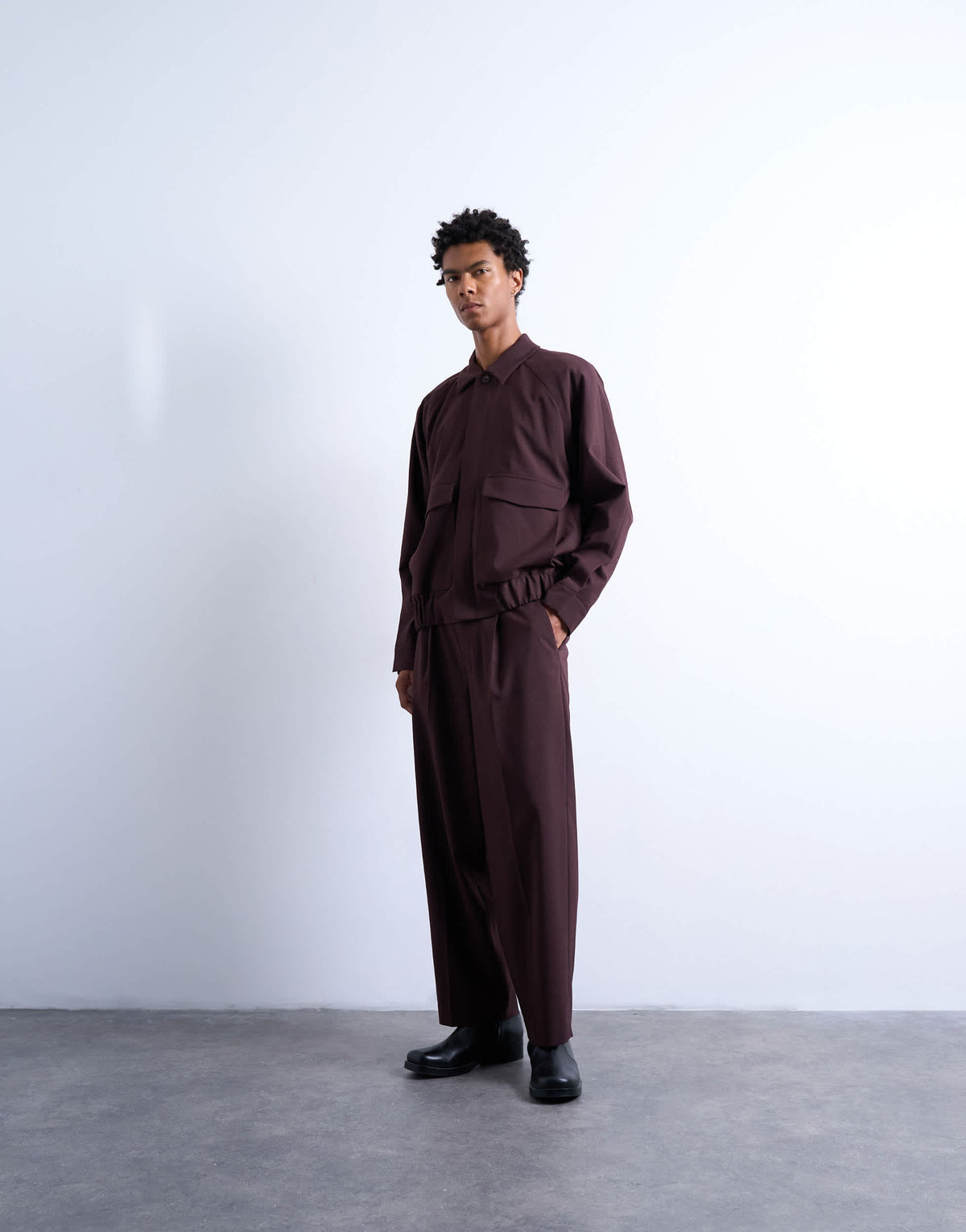 Topman relaxed tapered trousers in burgundy