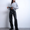 Pantalon Topshop en similicuir noir, taille basse.