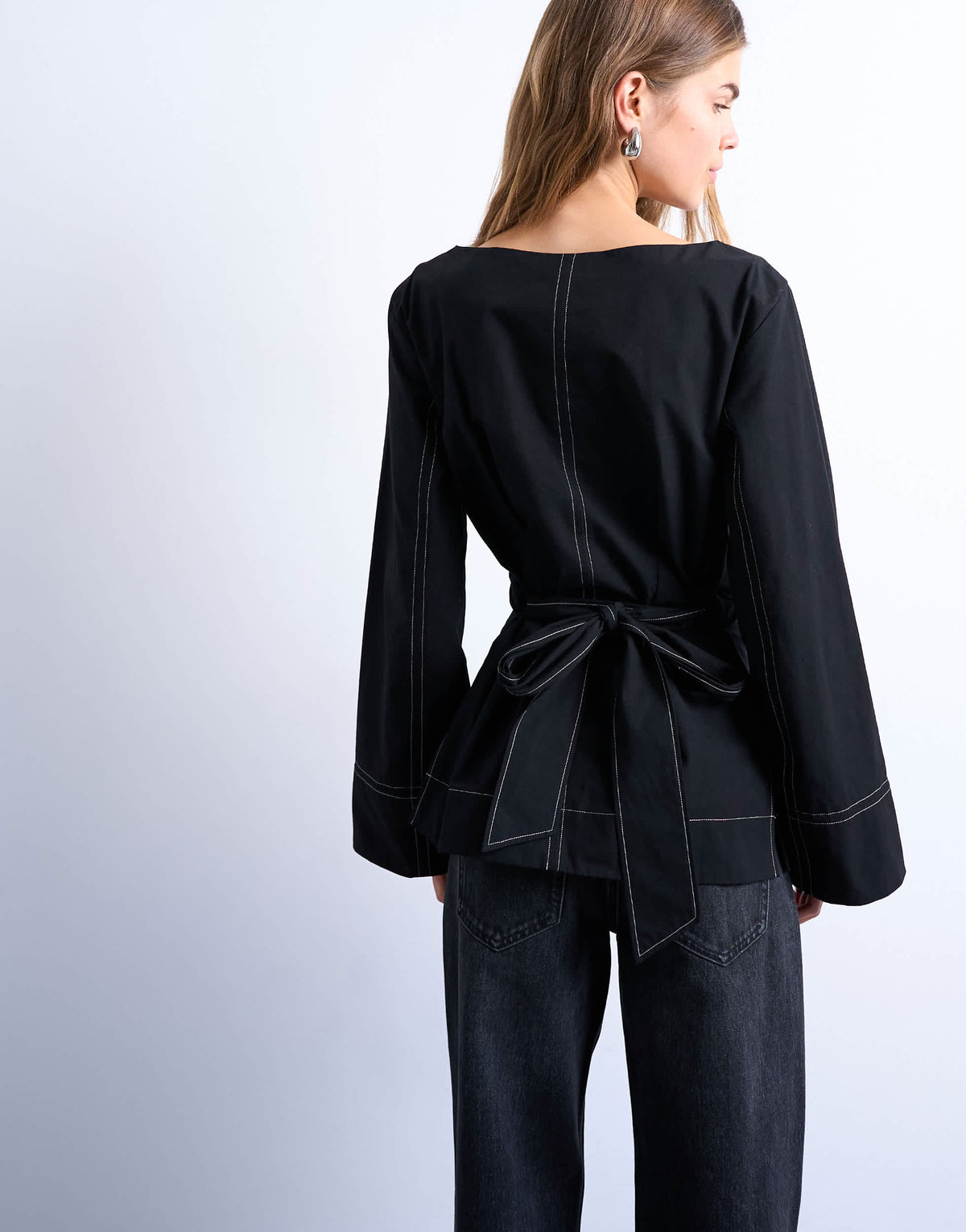 Topshop long sleeve tie waist top in black with contrast stitch