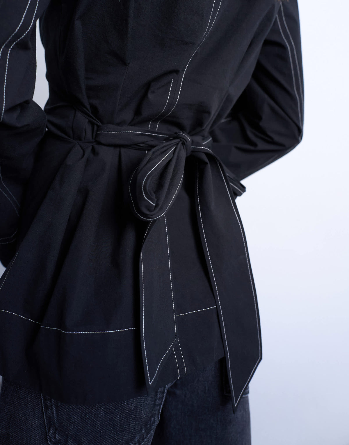 Topshop long sleeve tie waist top in black with contrast stitch