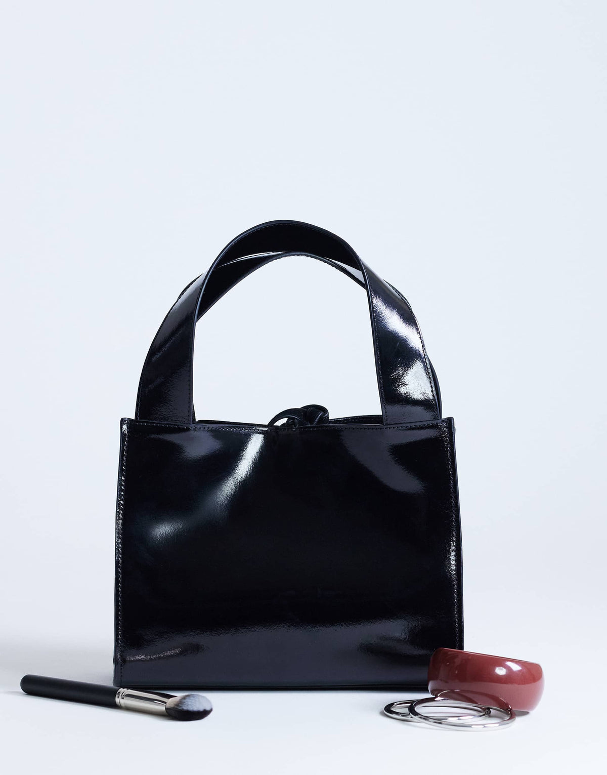Topshop Sandy small real suede and leather grab bag with tie fastening in black