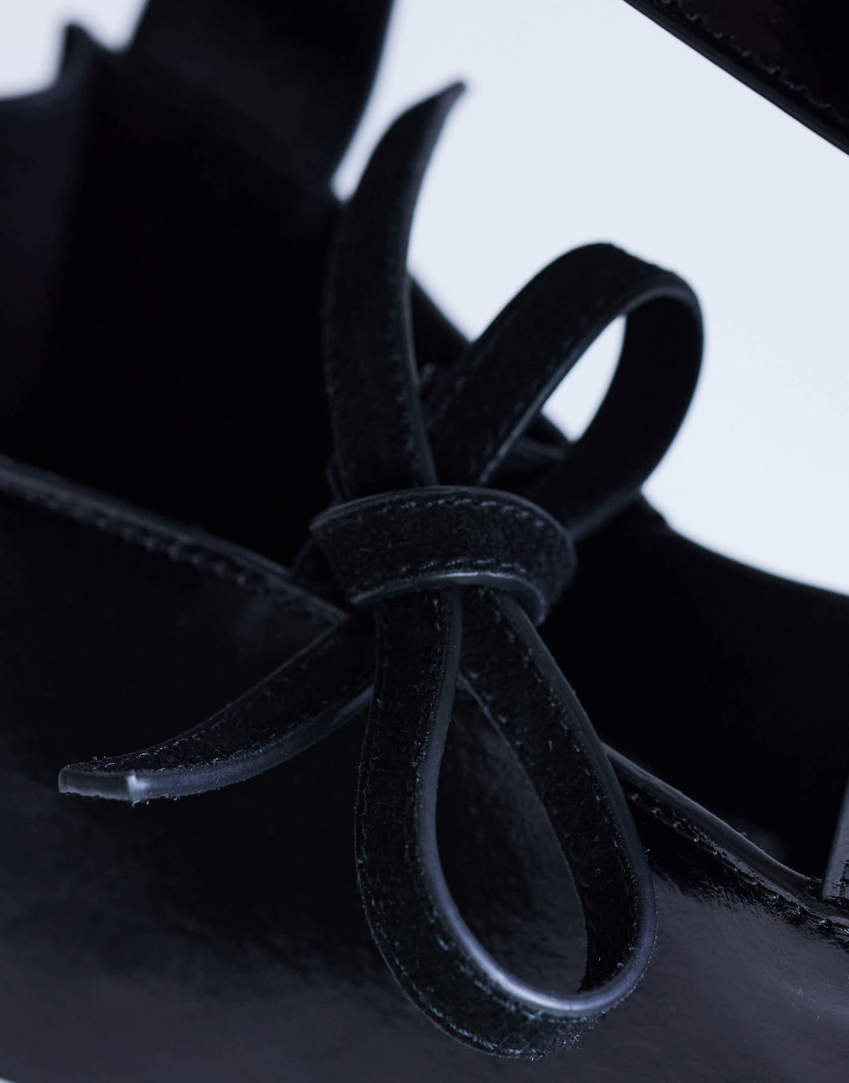 Topshop Sandy small real suede and leather grab bag with tie fastening in black