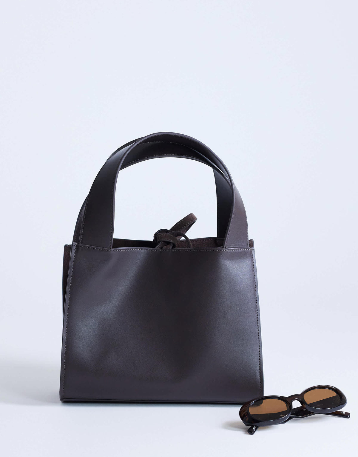 Topshop Sandy small real suede and leather grab bag with tie fastening in chocolate