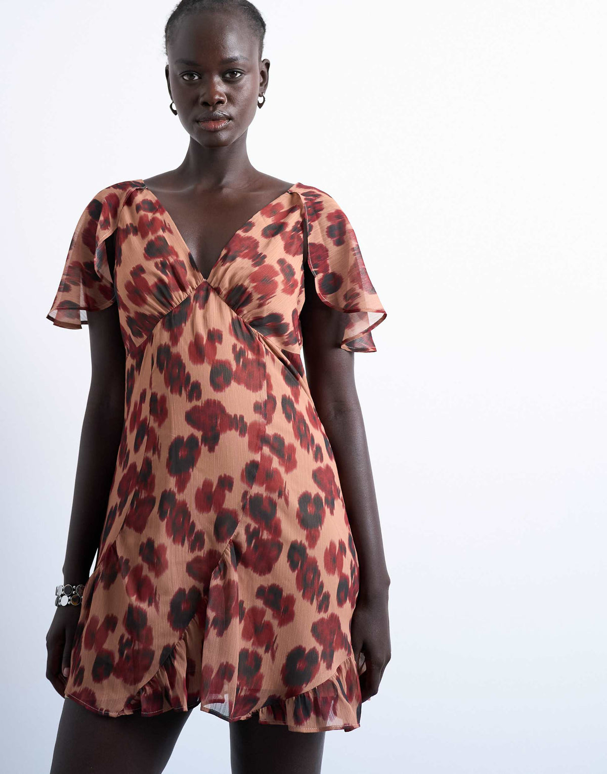 Topshop cape sleeve godet hem mini dress in modern print