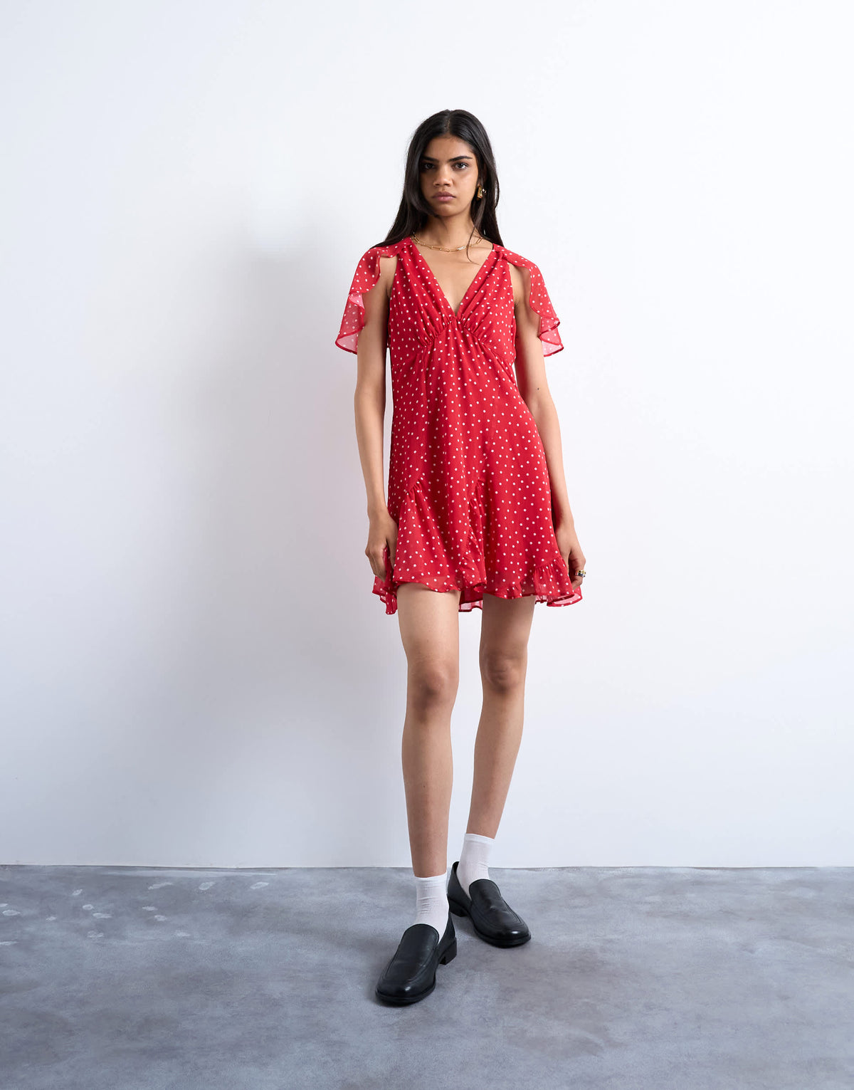 Topshop cape sleeve godet hem mini dress in red based spot