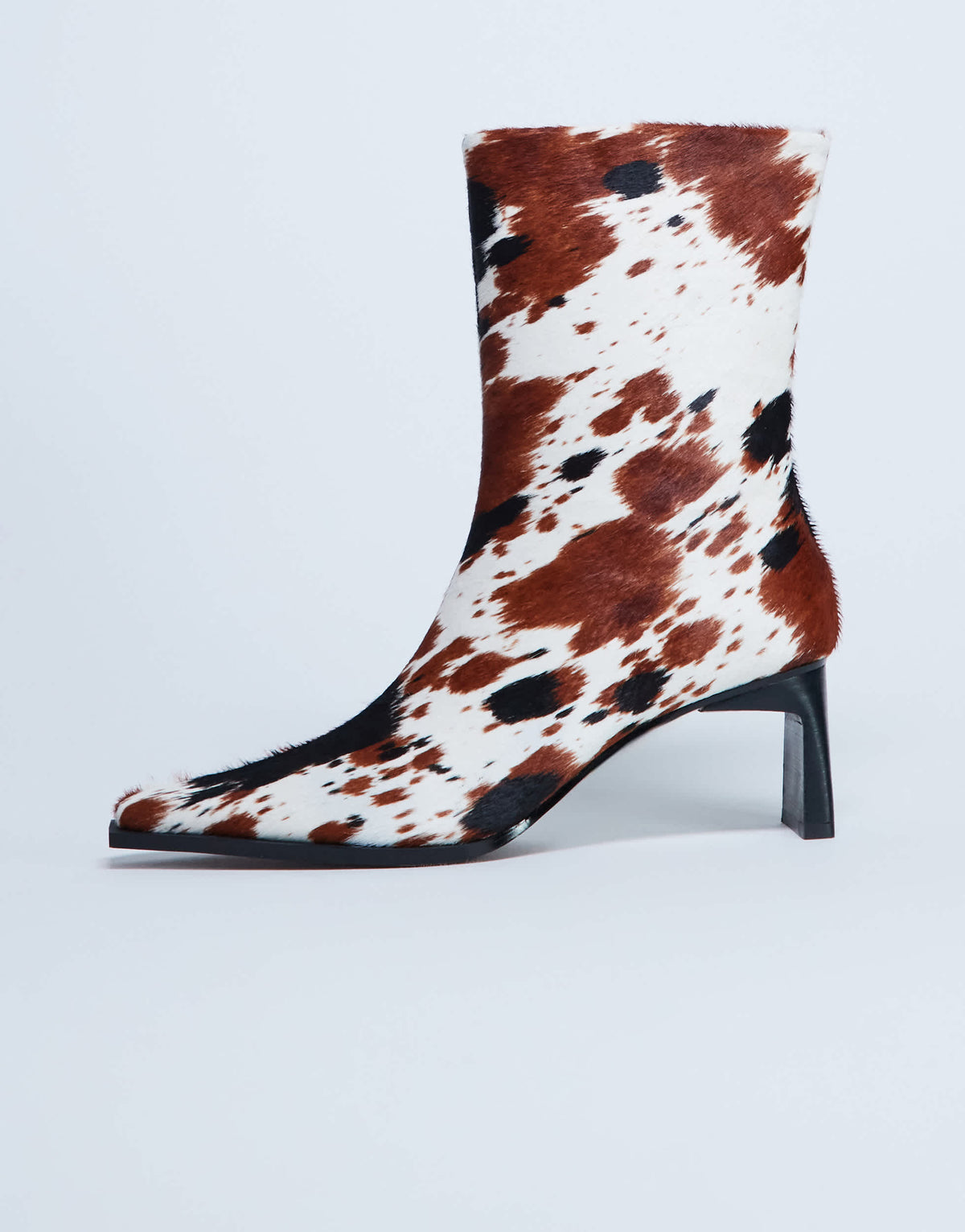 Topshop Nadie chisel toe ankle boot in cow print hair on real leather