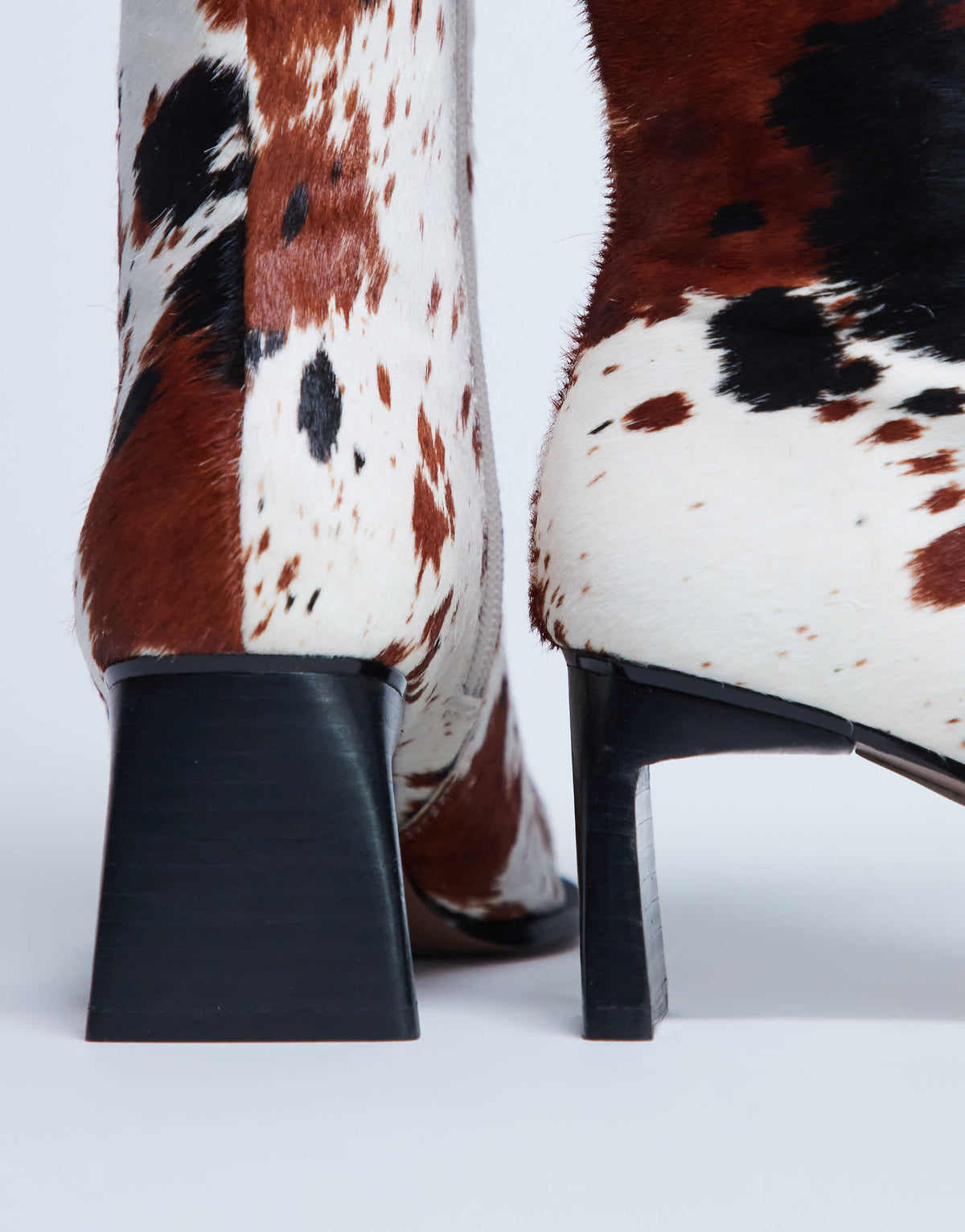 Topshop Nadie chisel toe ankle boot in cow print hair on real leather