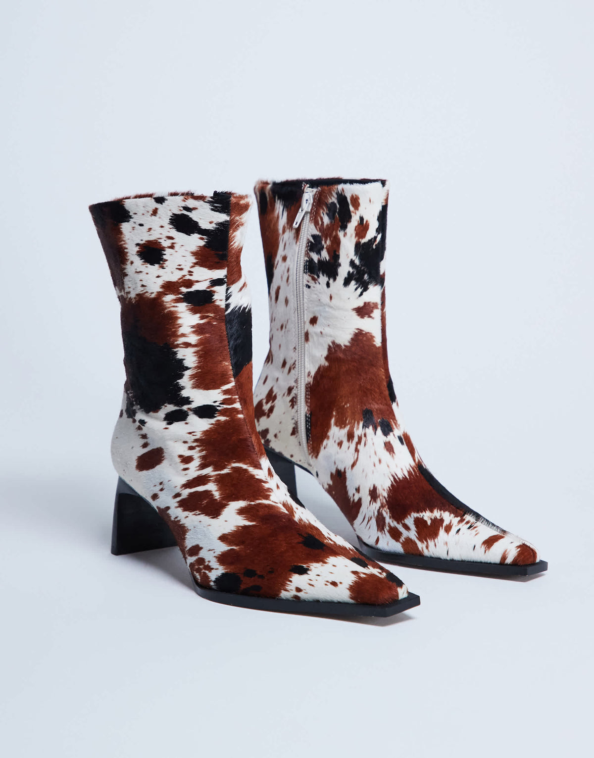 Topshop Nadie chisel toe ankle boot in cow print hair on real leather