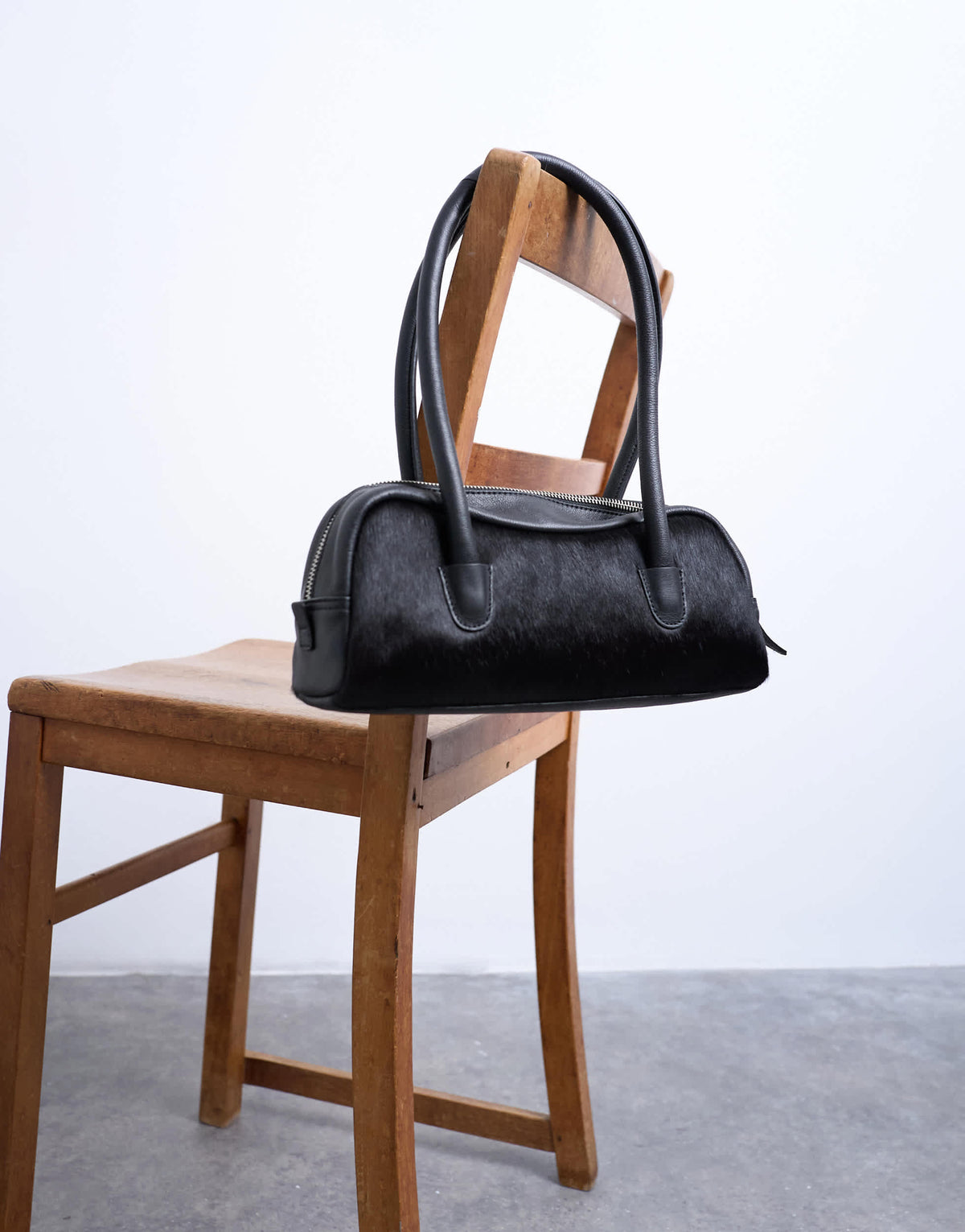 Topshop Sullivan small hair on leather shoulder bowler bag in black