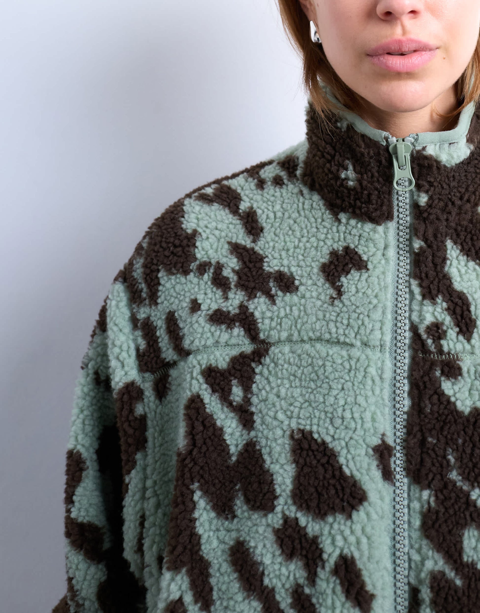 Topshop brown and teal cow print borg fleece jacket with contrast teal binding in multi