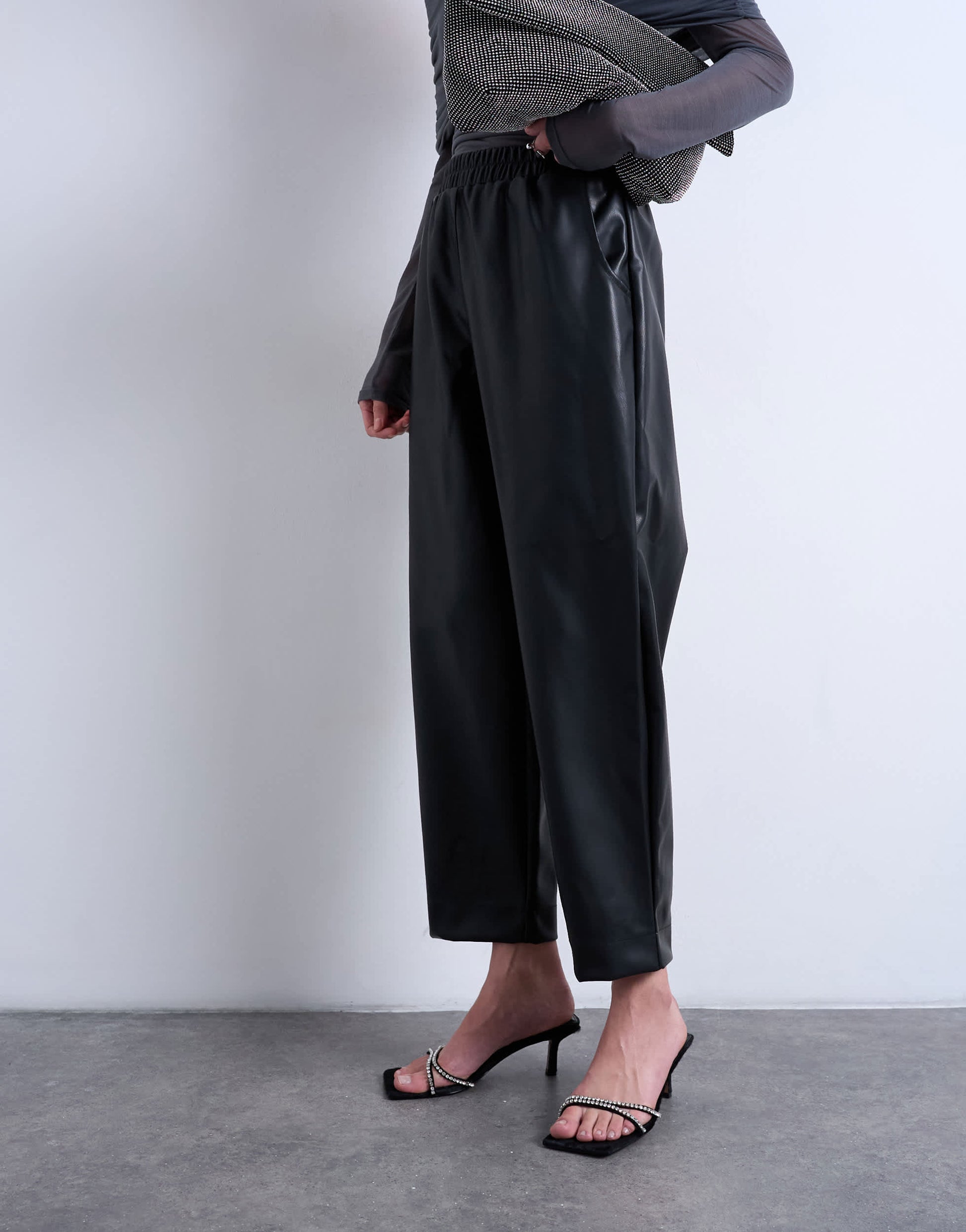 Topshop faux leather awkward length pull on trouser in black