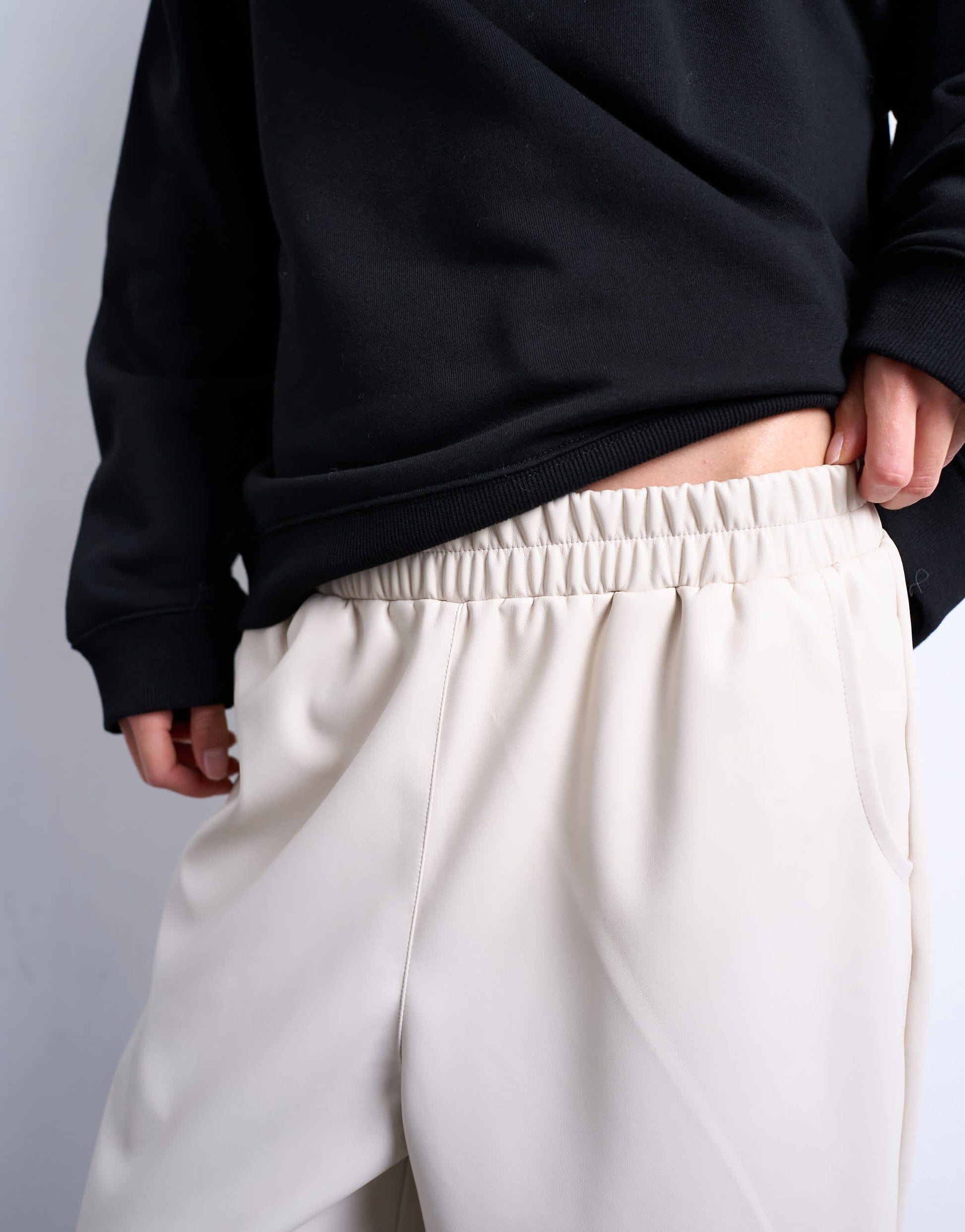 Topshop faux leather awkward length pull on trouser in ecru