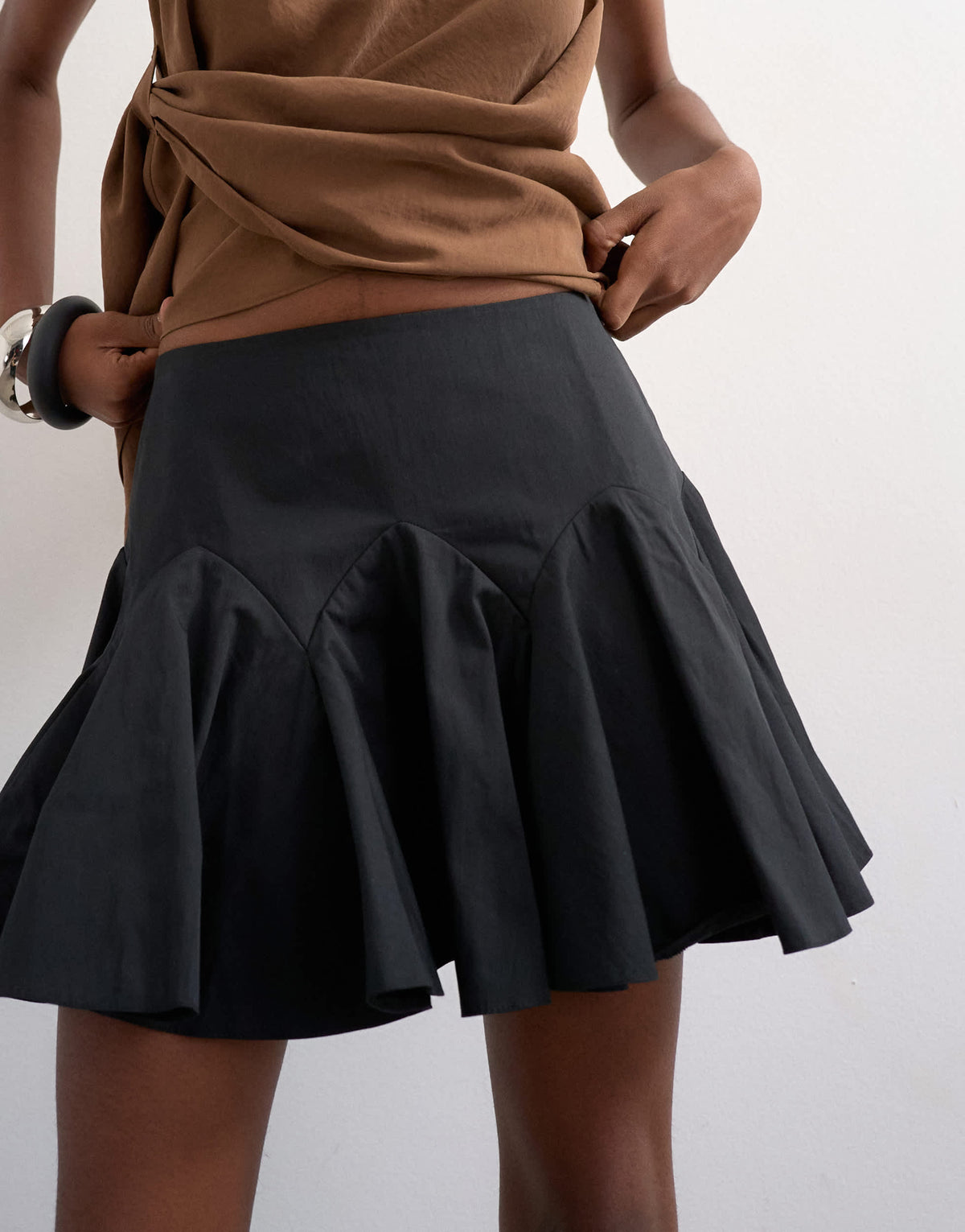 Topshop curved godet hem mini skirt in black