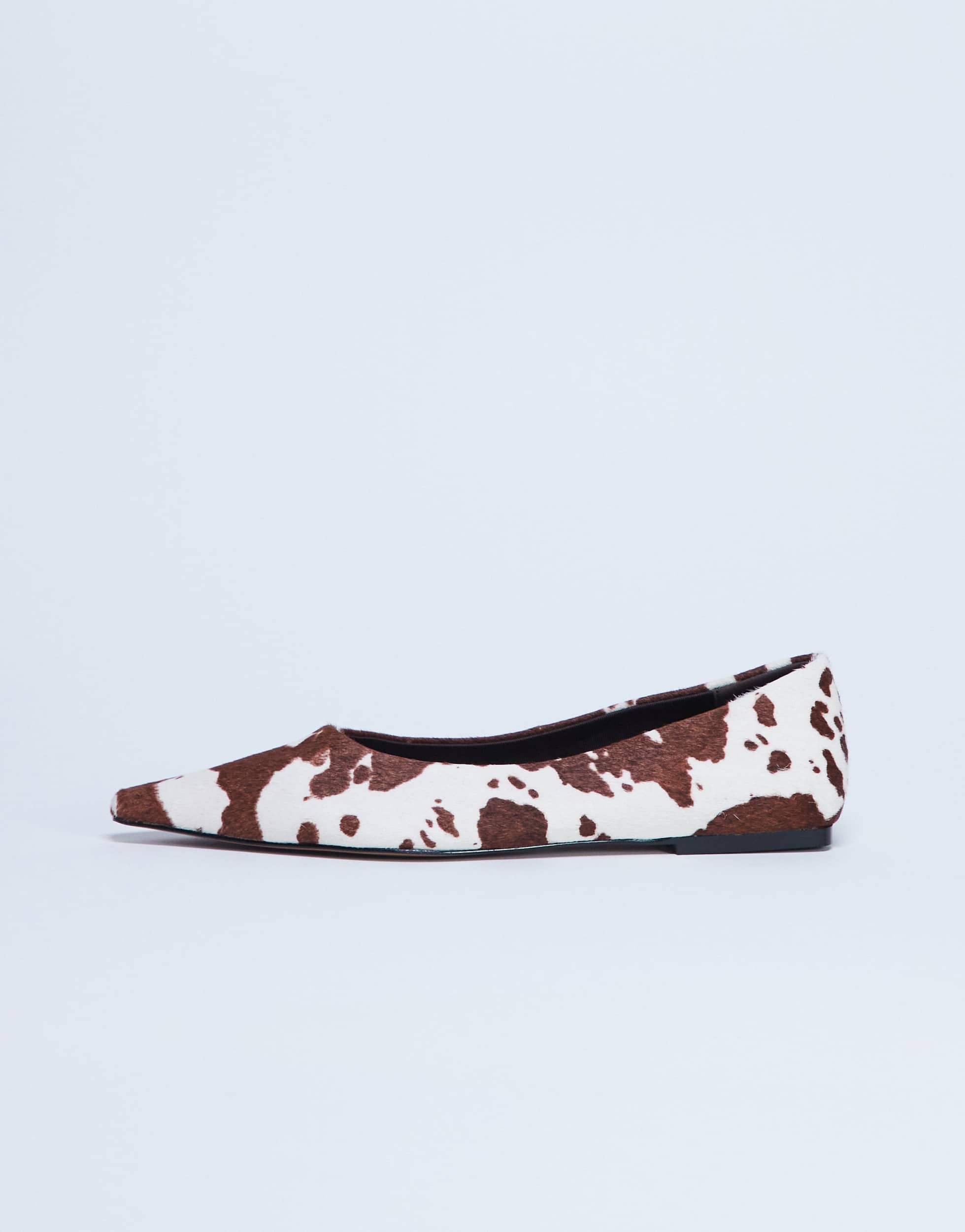 Topshop Ace point toe flat shoe in cow print hair on real leather 