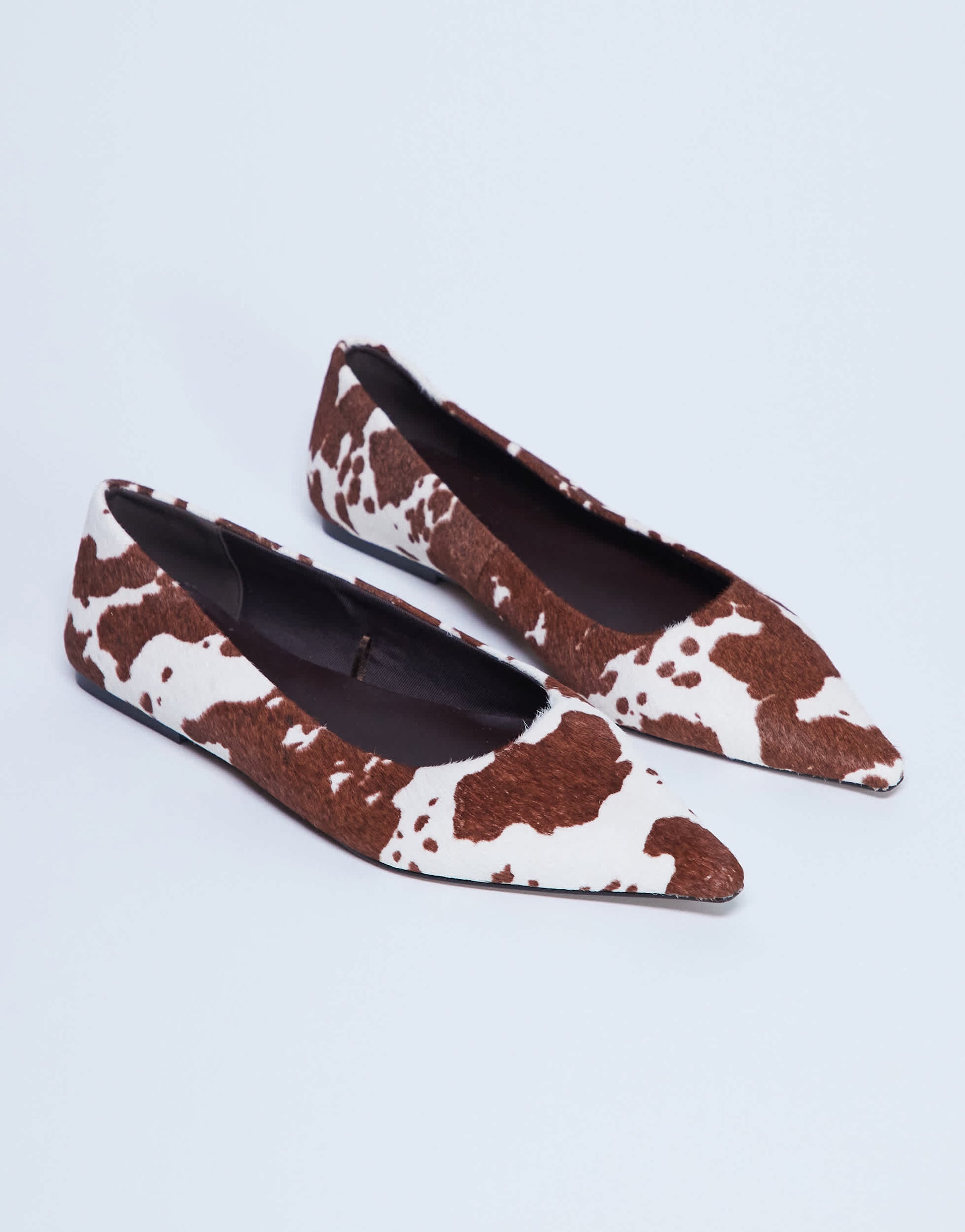 Topshop Ace point toe flat shoe in cow print hair on real leather 