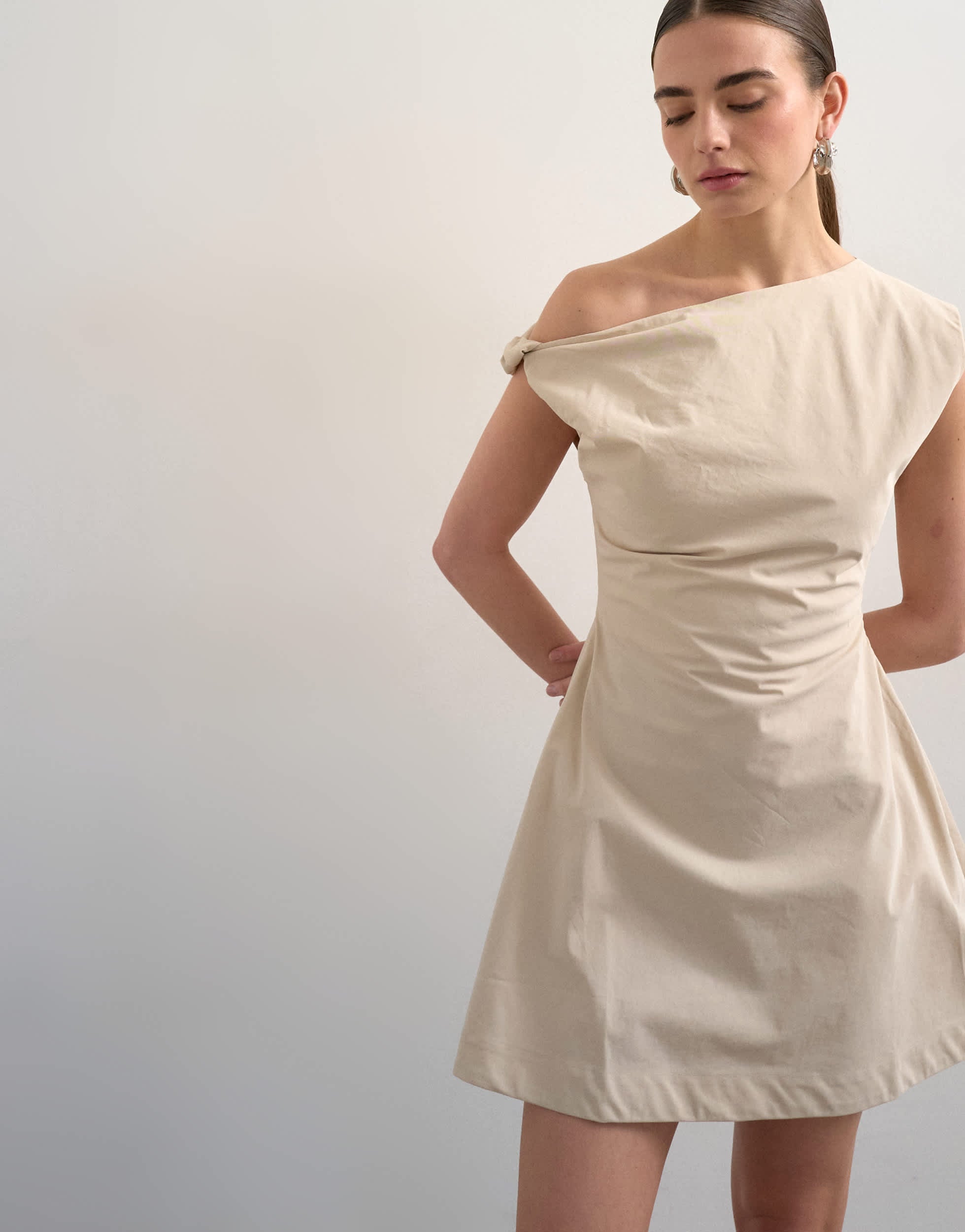Topshop structured mini dress with twist shoulder in off white