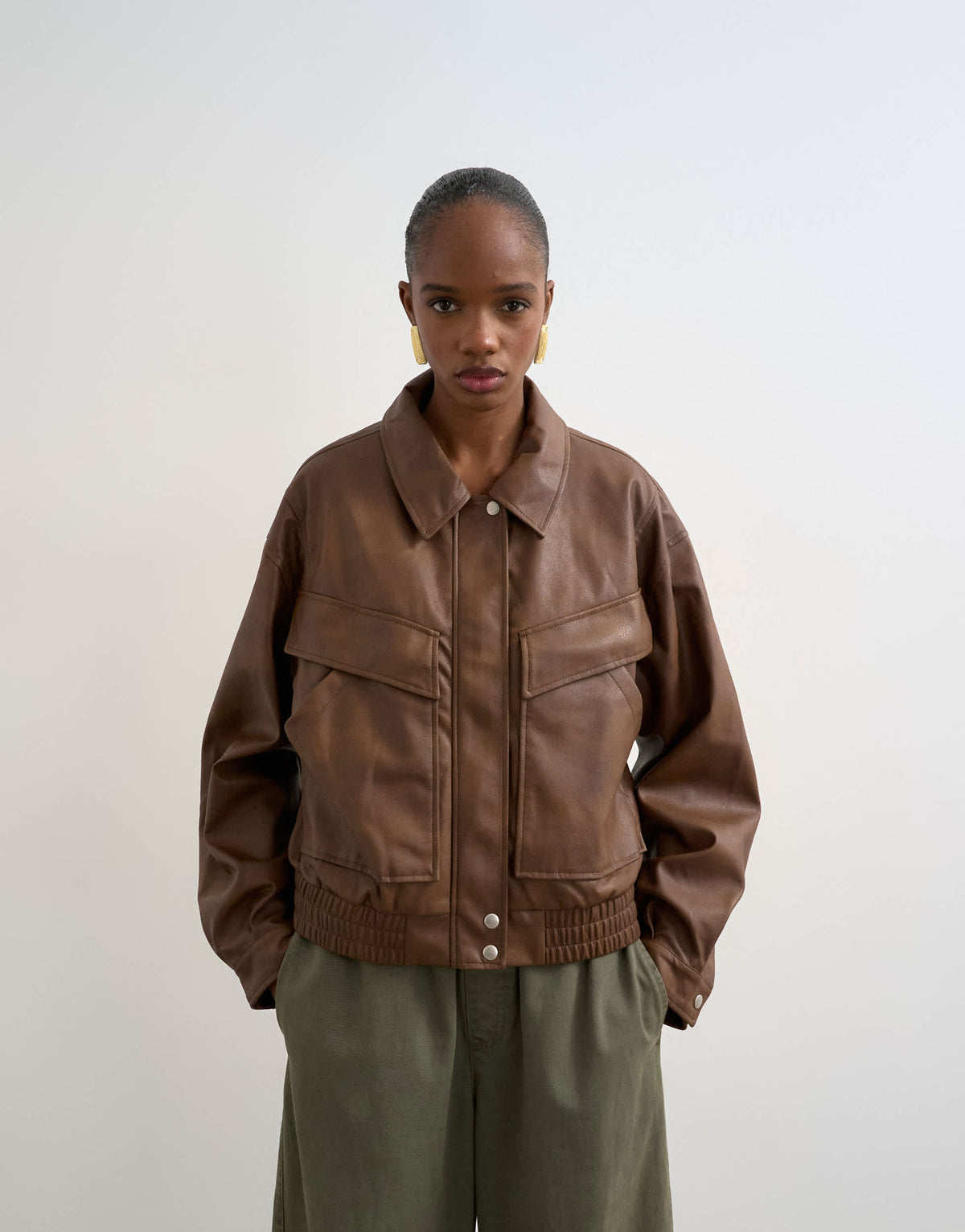 Topshop faux leather boxy zip through pocket bomber jacket in washed brown
