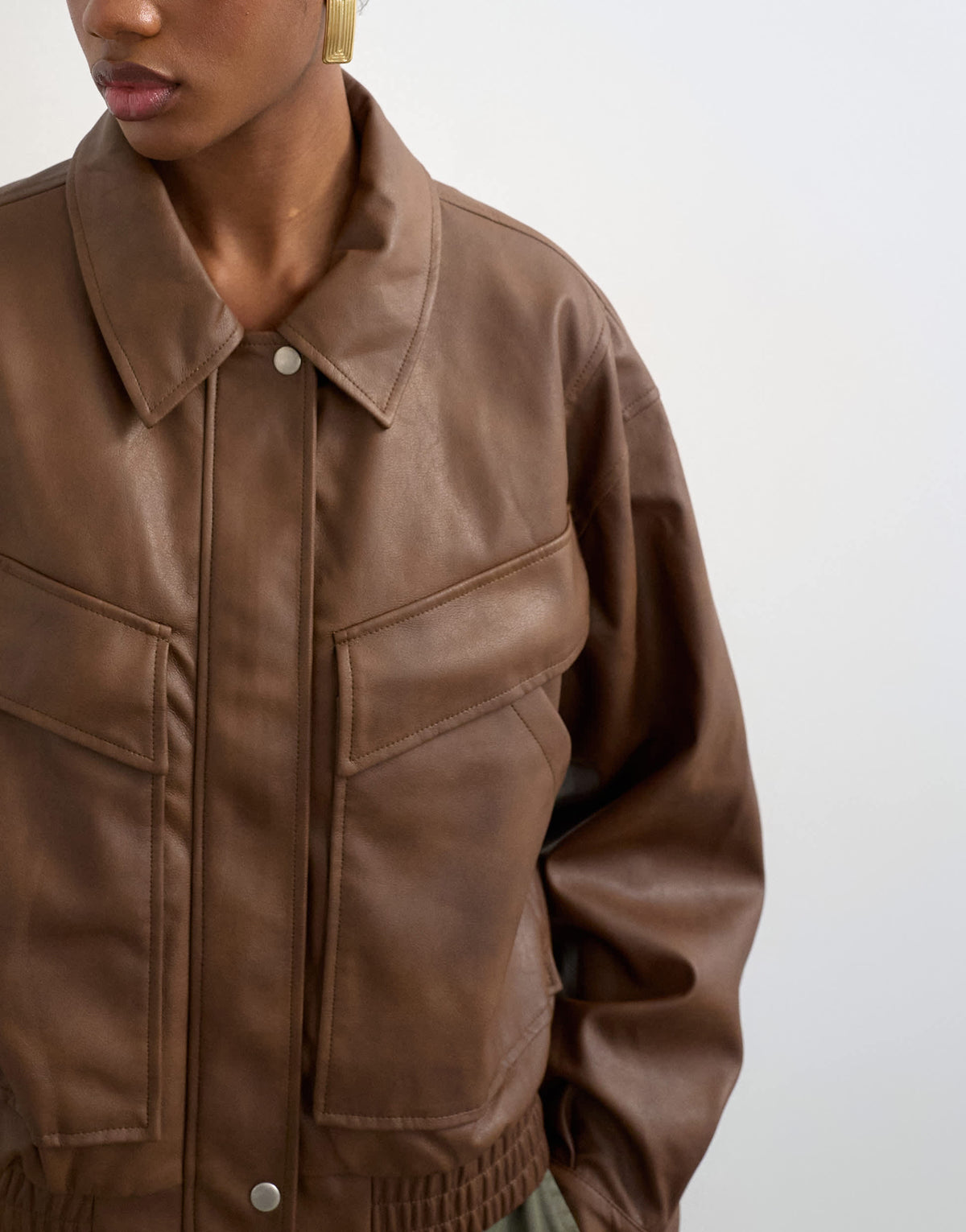 Topshop faux leather boxy zip through pocket bomber jacket in washed brown