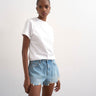 Topshop denim A-line shorts with rip in bleach