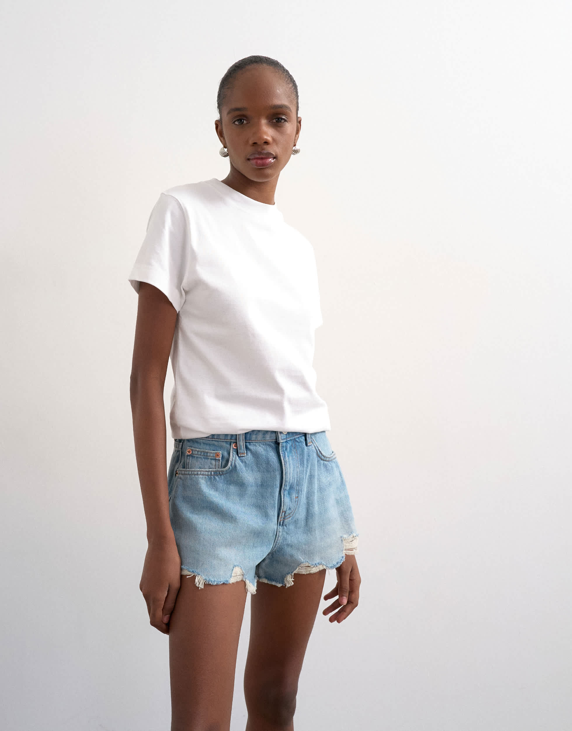 Topshop denim A-line shorts with rip in bleach