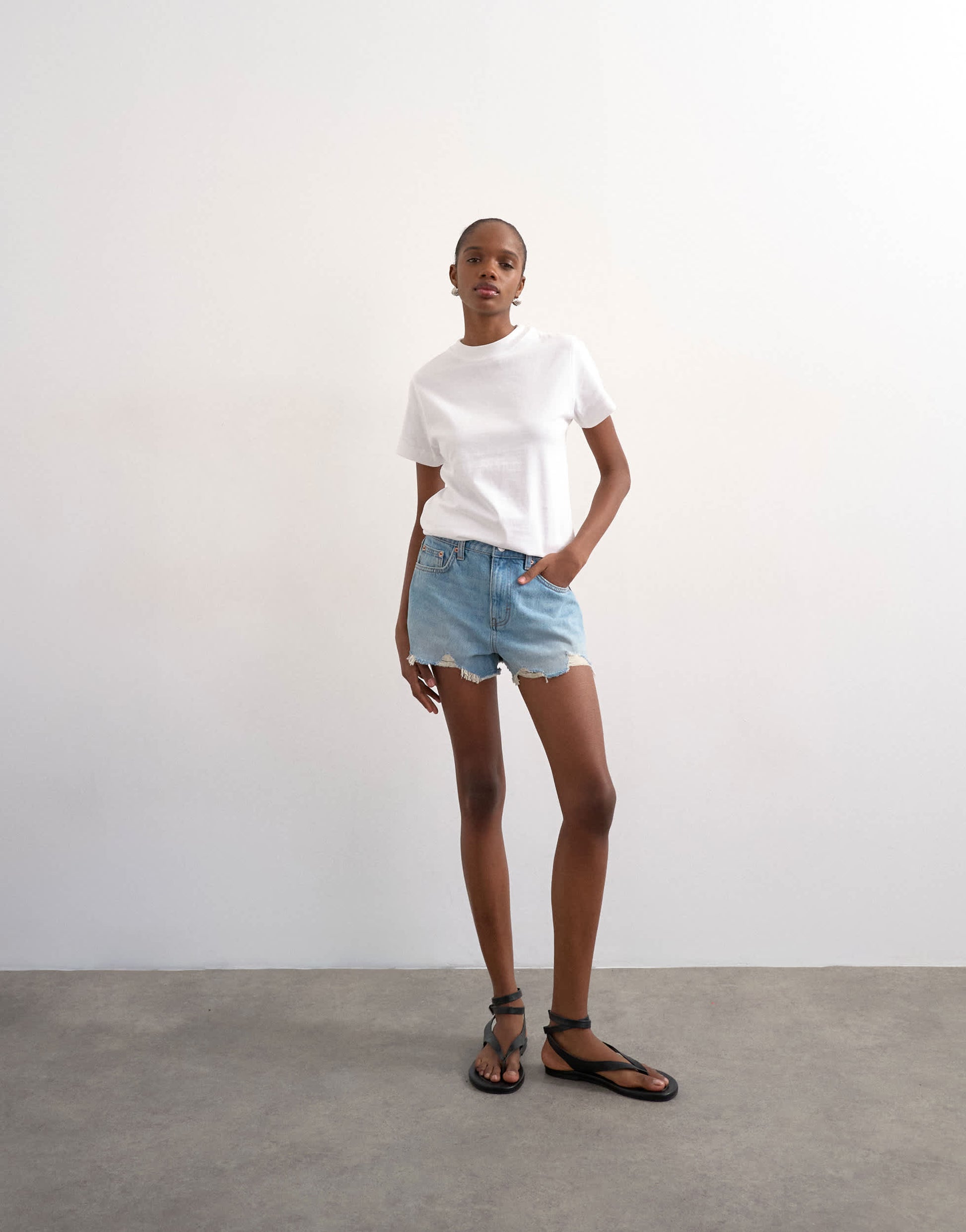 Topshop denim A-line shorts with rip in bleach