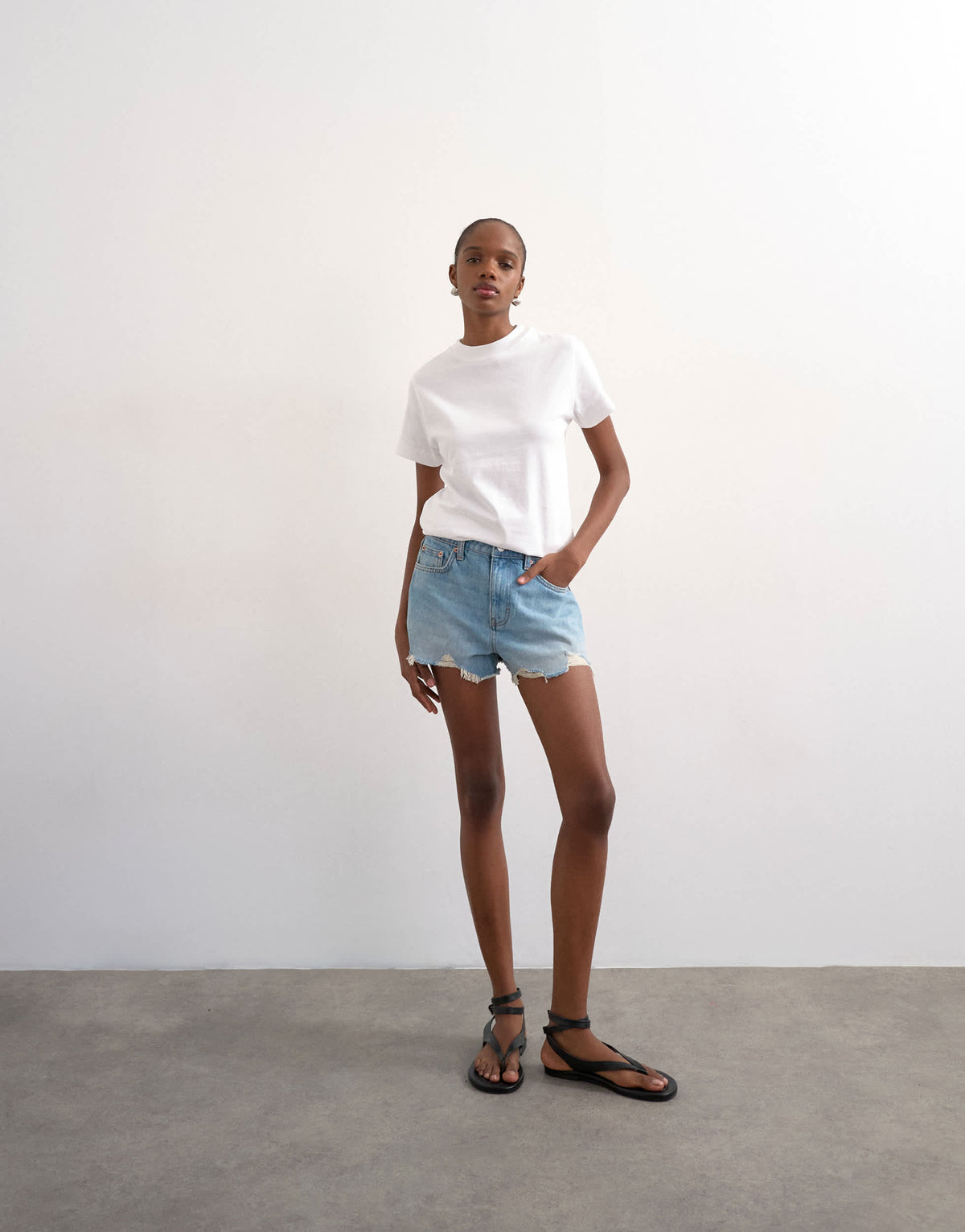 Topshop denim A-line shorts with rip in bleach