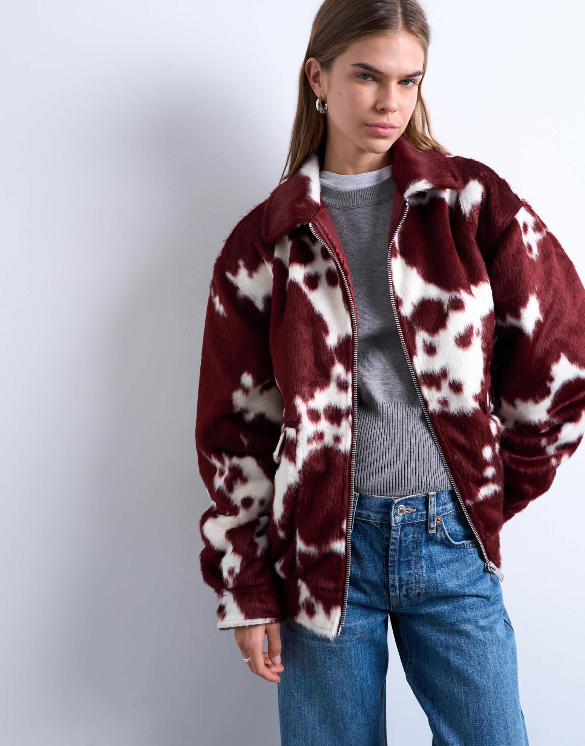 Topshop faux fur cow print bomber jacket