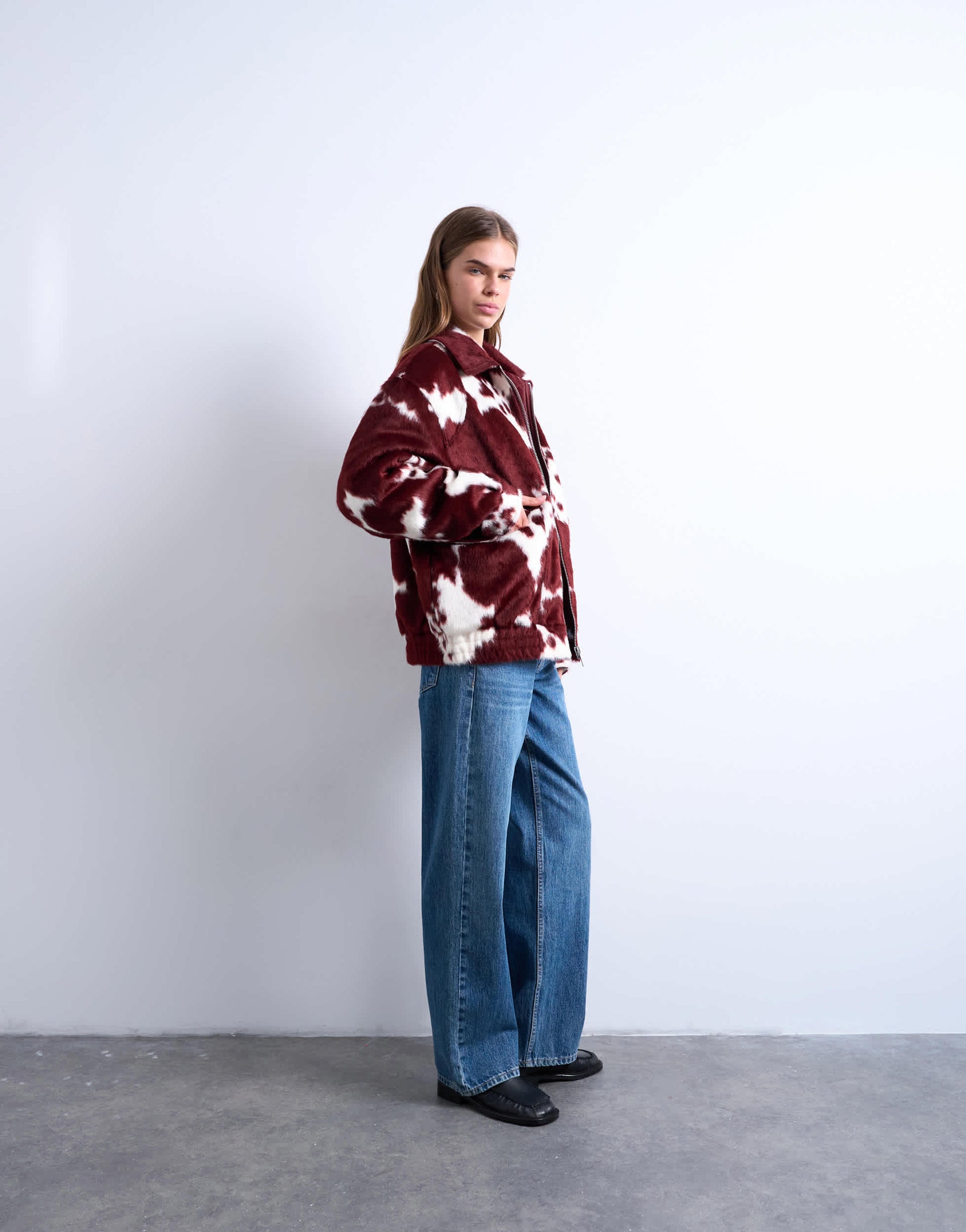 Topshop faux fur cow print bomber jacket
