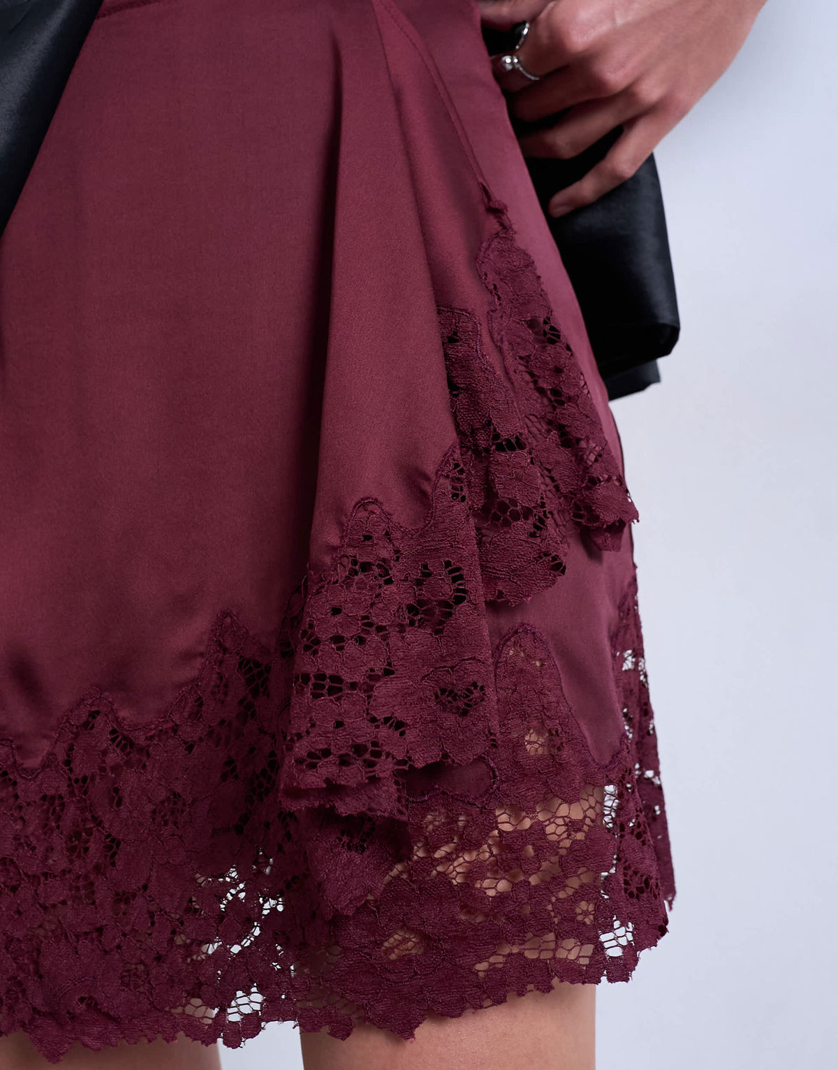 Topshop satin aymmetric mini skirt with lace trim in port royale